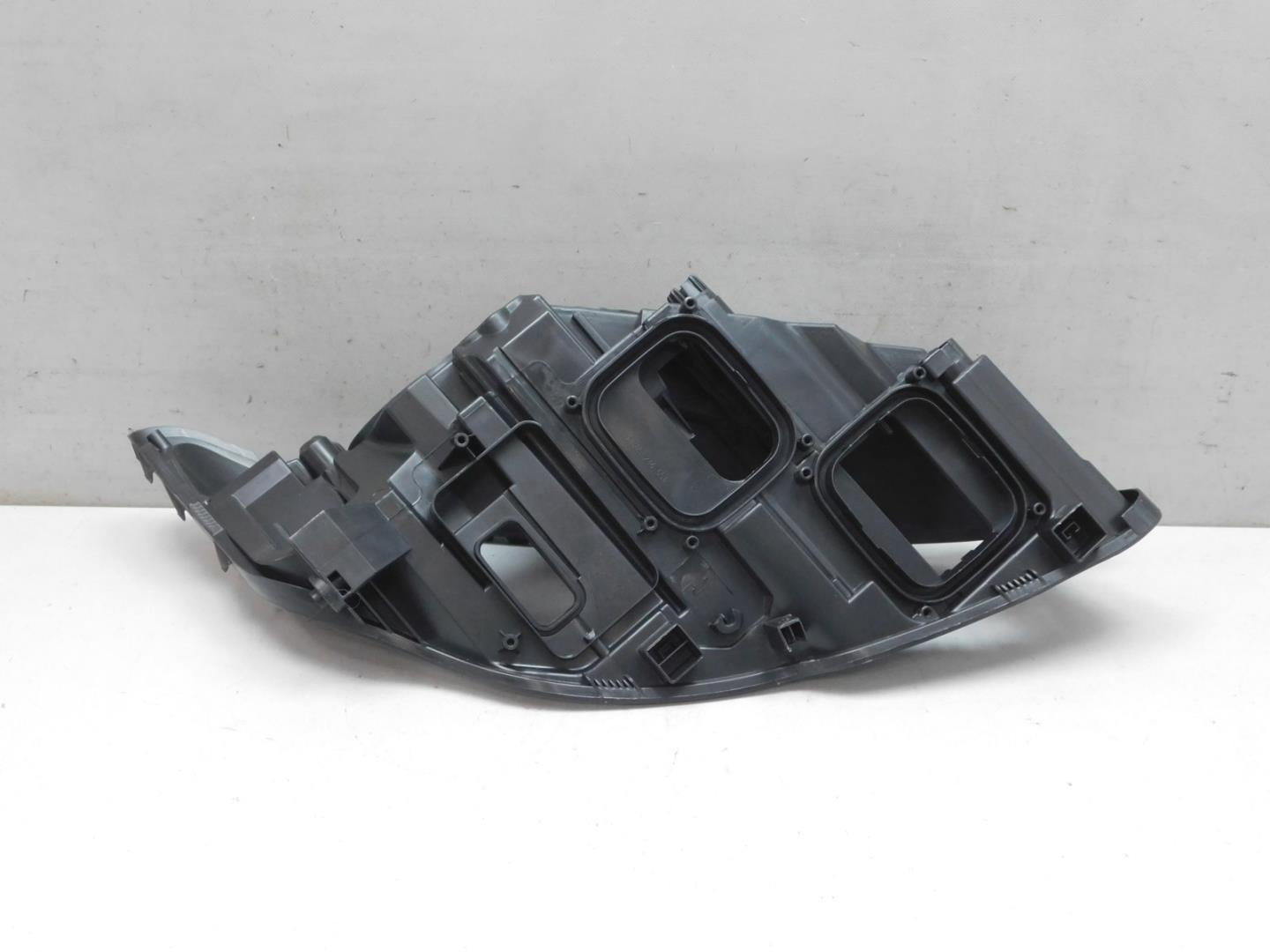 Корпус фары левой