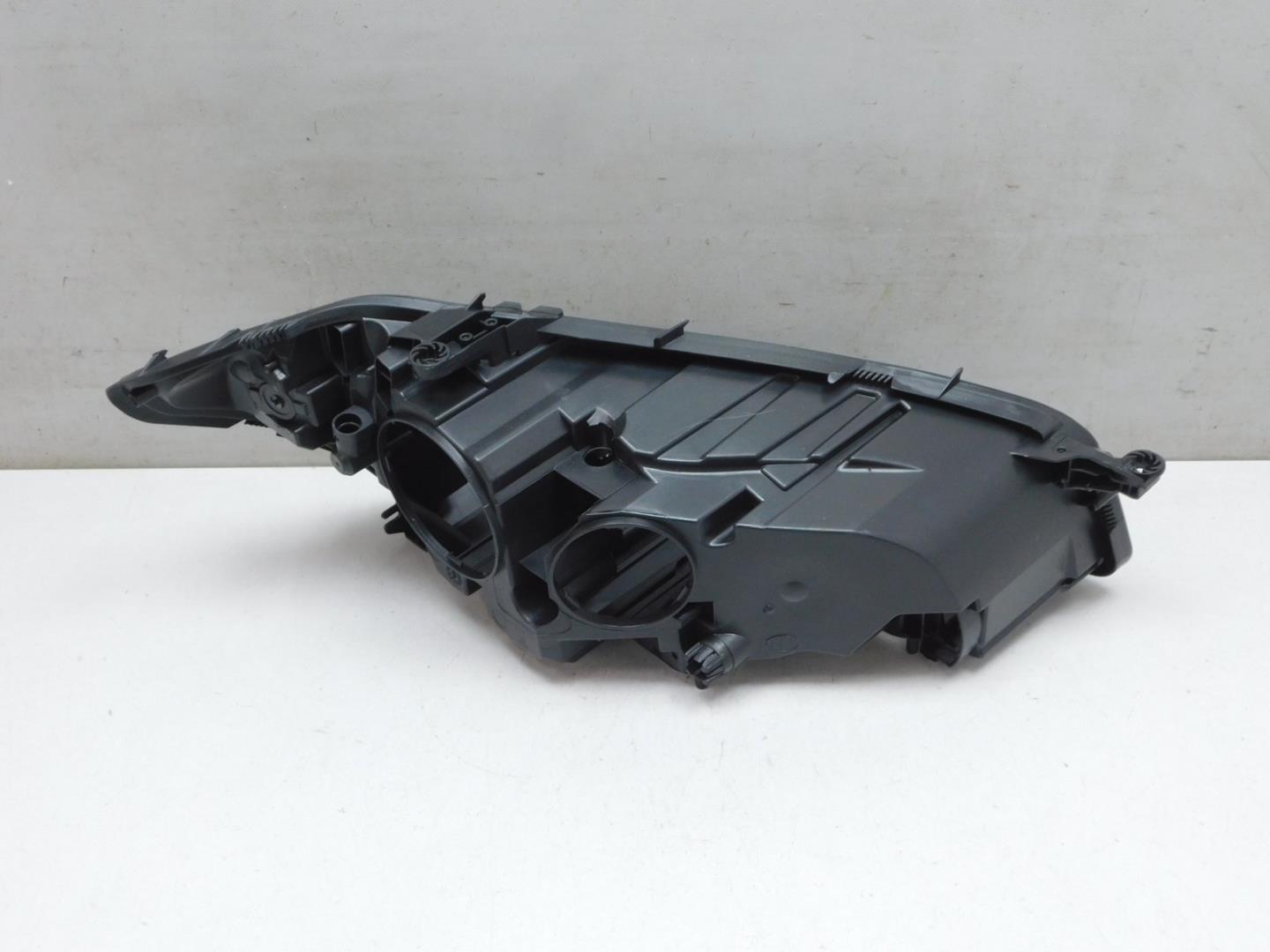 Корпус фары левой