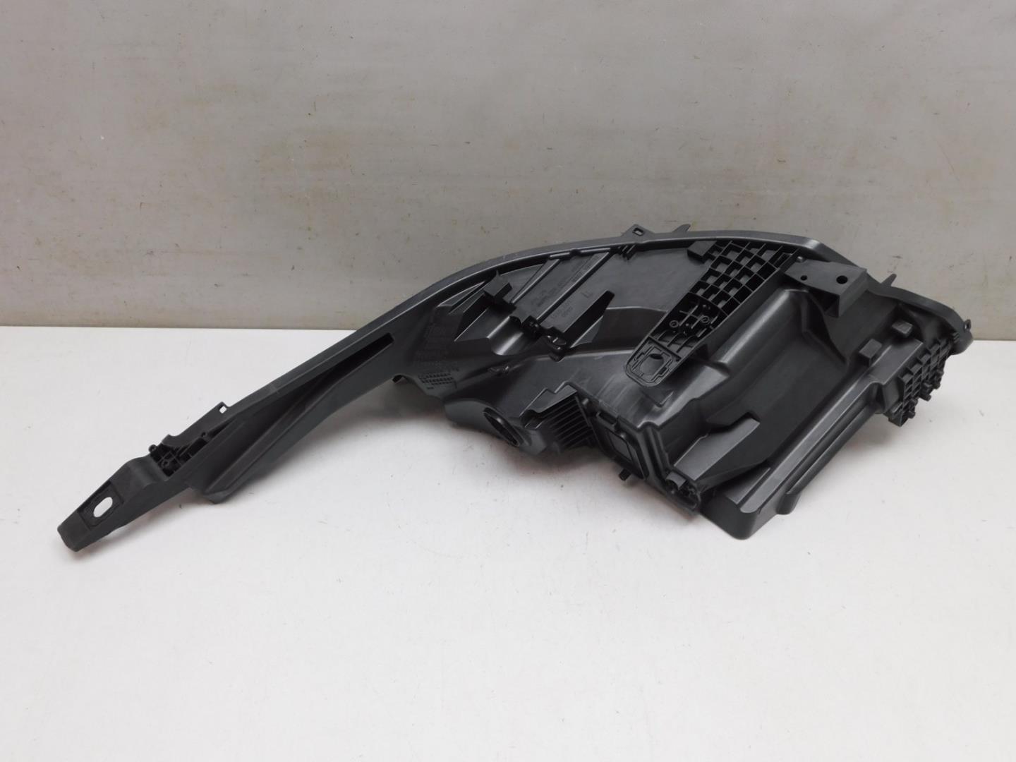 Корпус фары левой