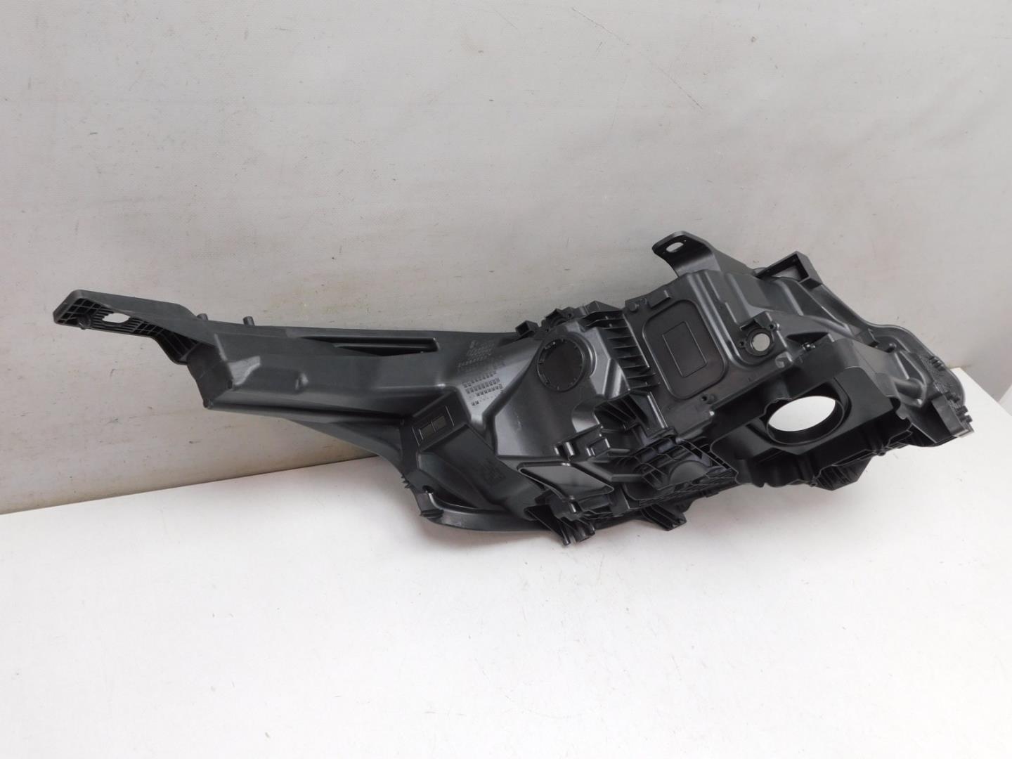 Корпус фары левой