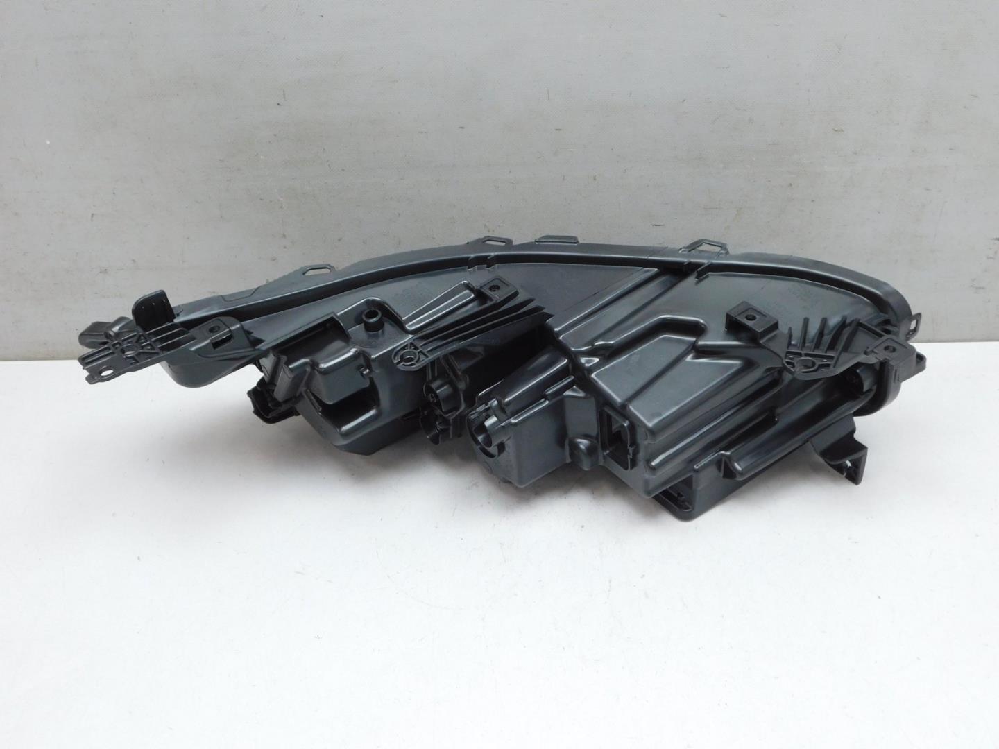 Корпус фары левой