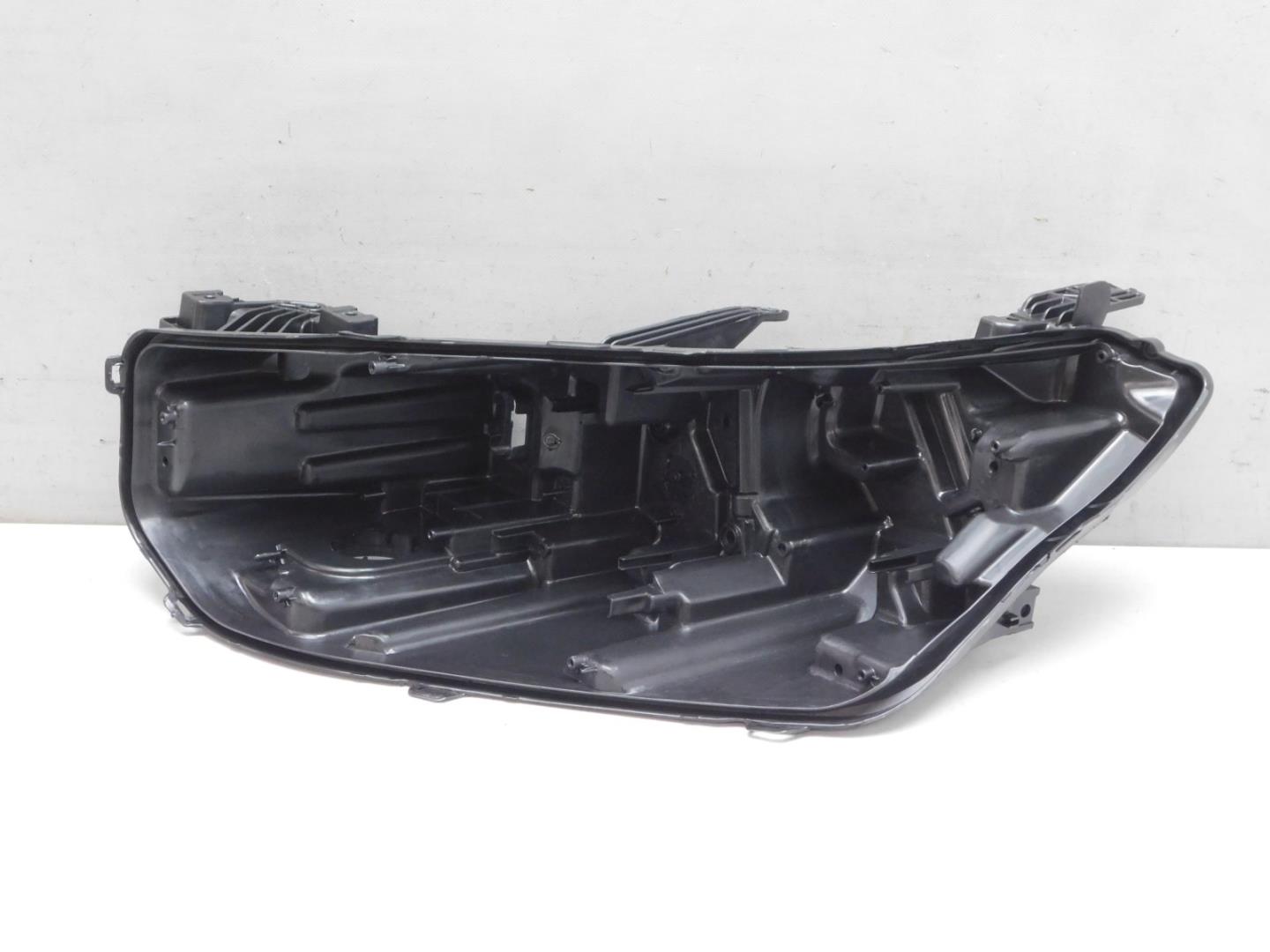 Корпус фары левой