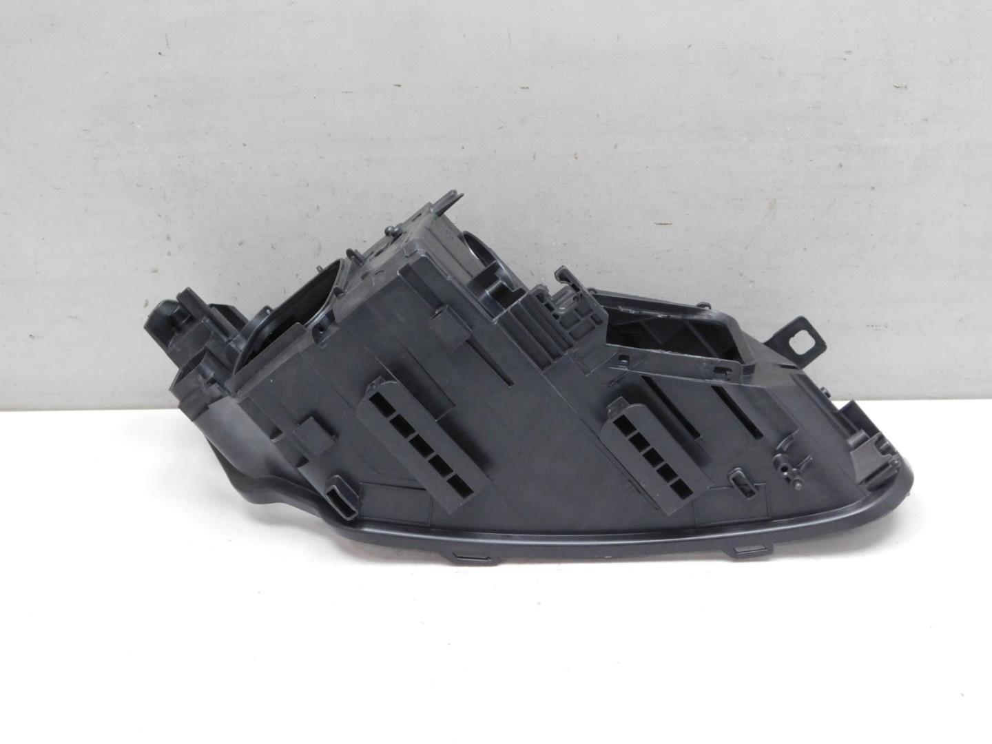 Корпус фары левой