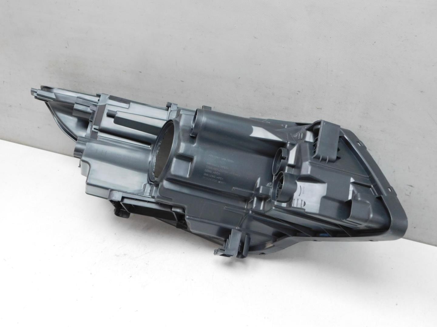 Корпус фары левой