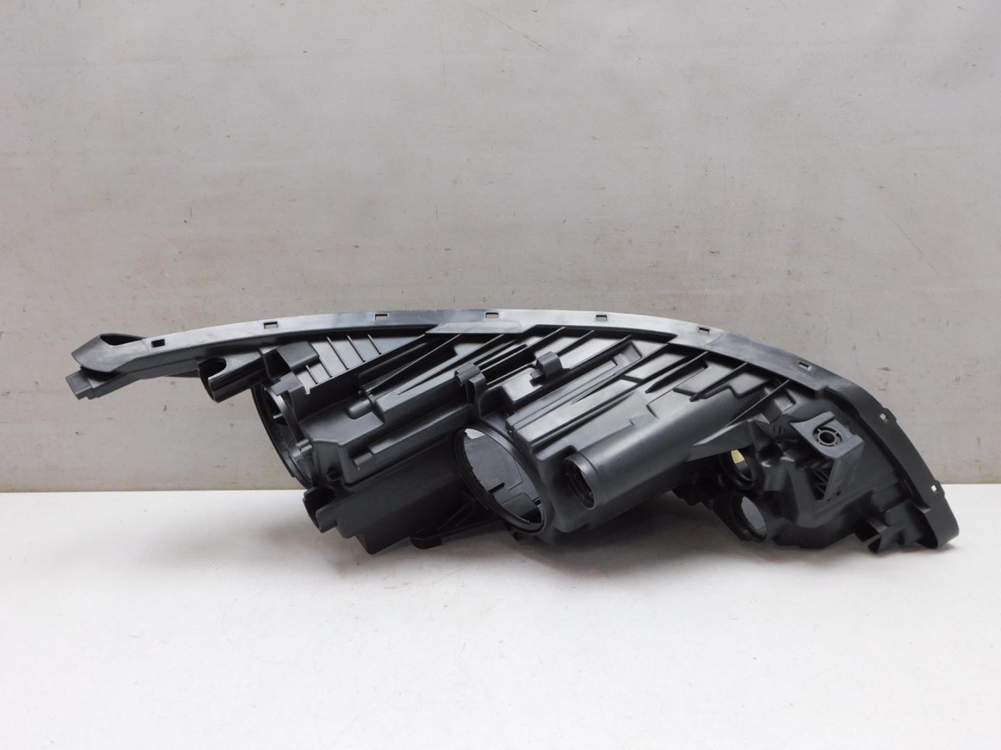 Корпус фары левой