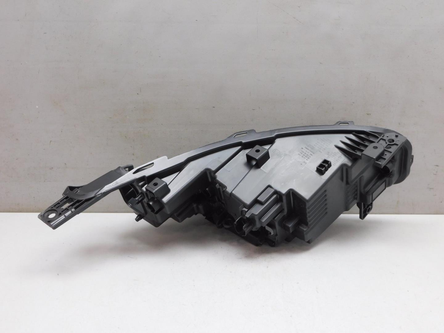 Корпус фары левой