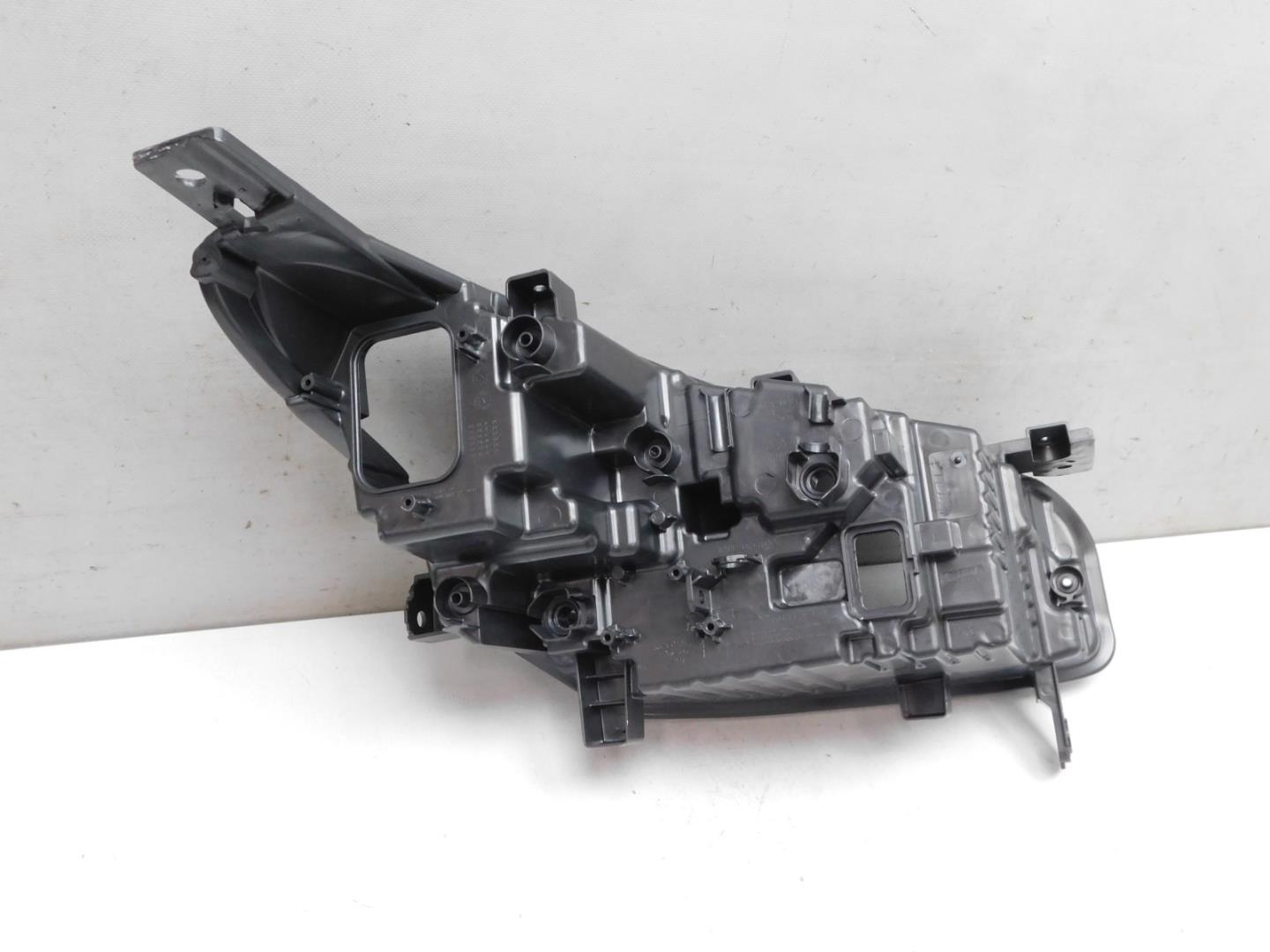 Корпус фары левой