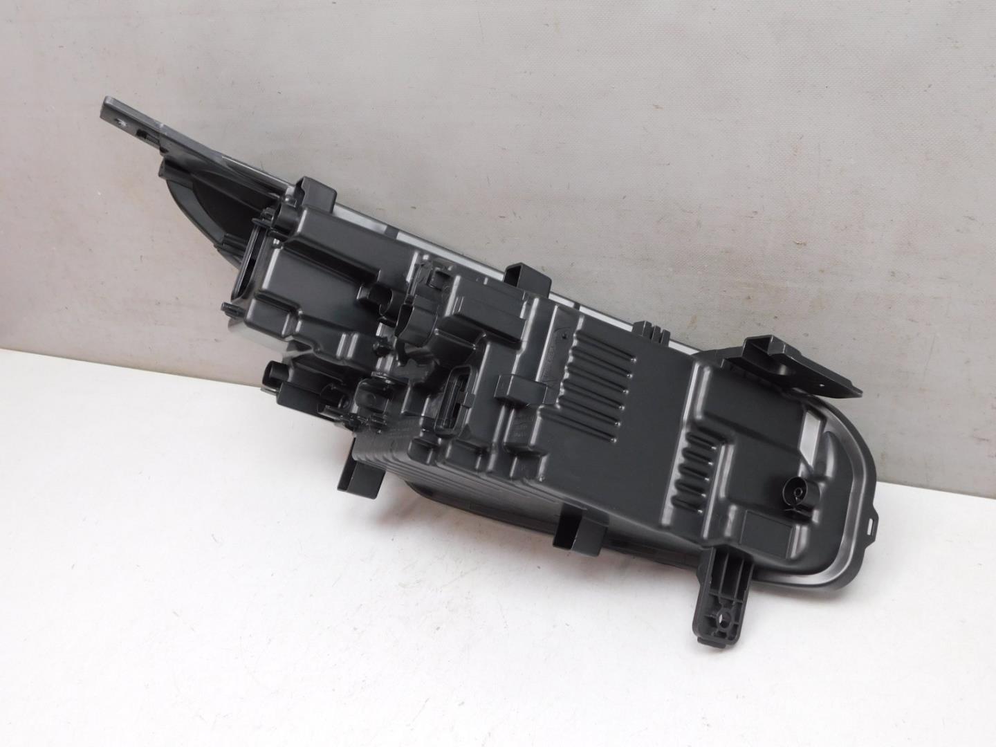 Корпус фары левой