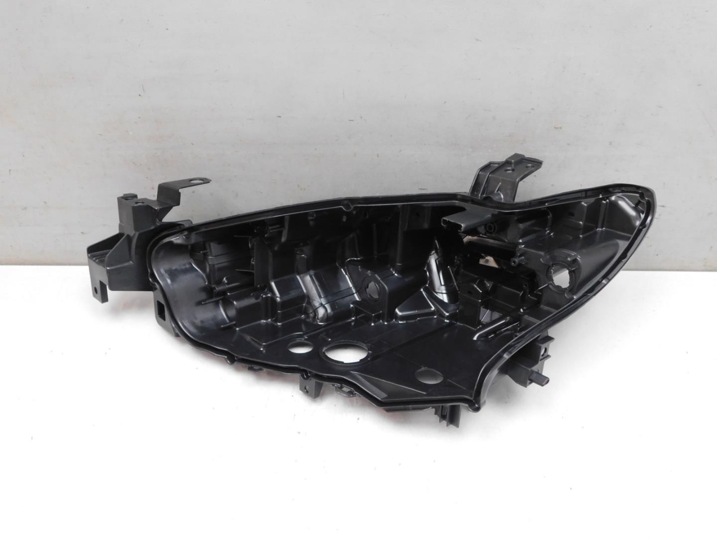 Корпус фары левой