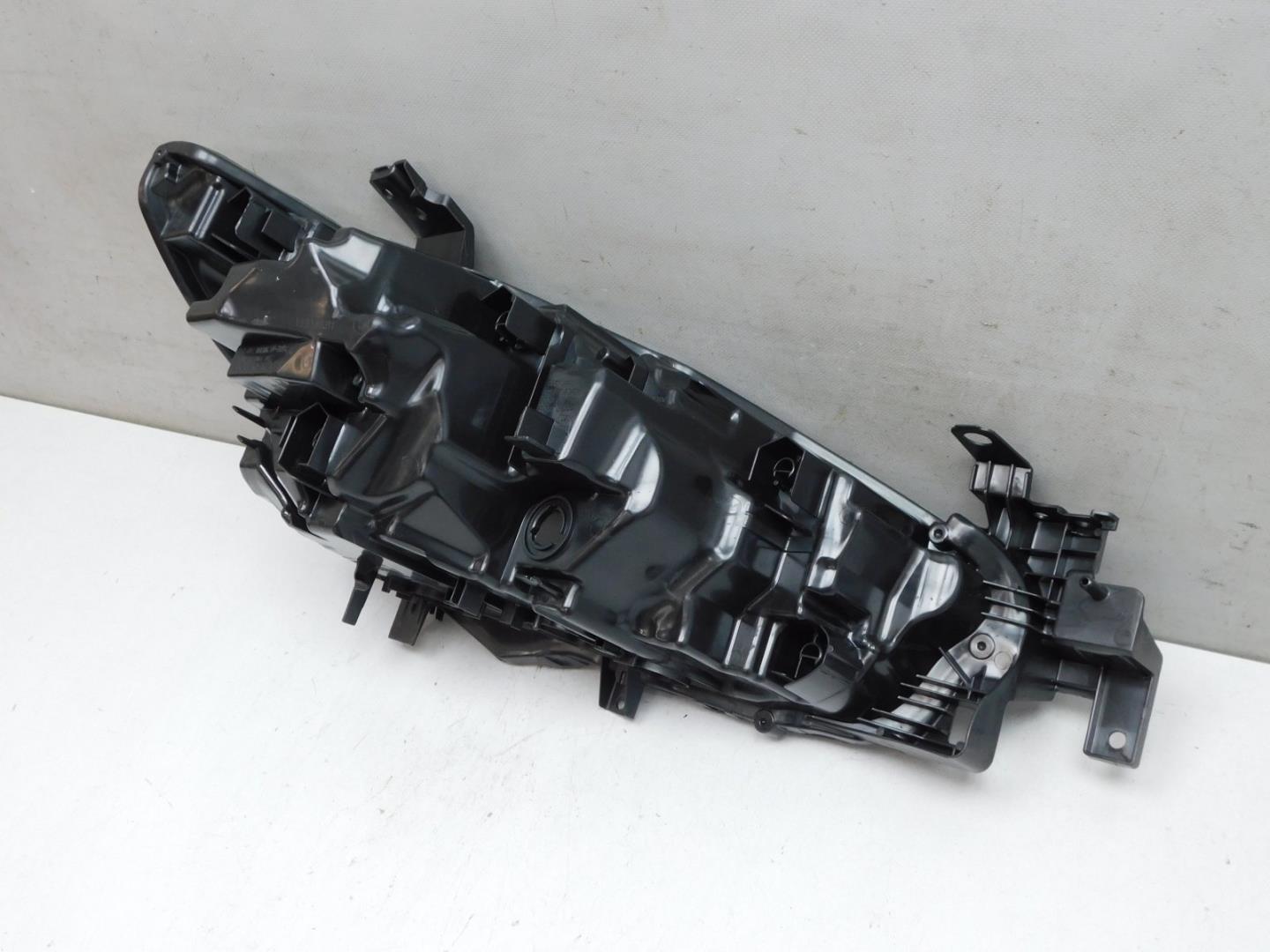 Корпус фары левой