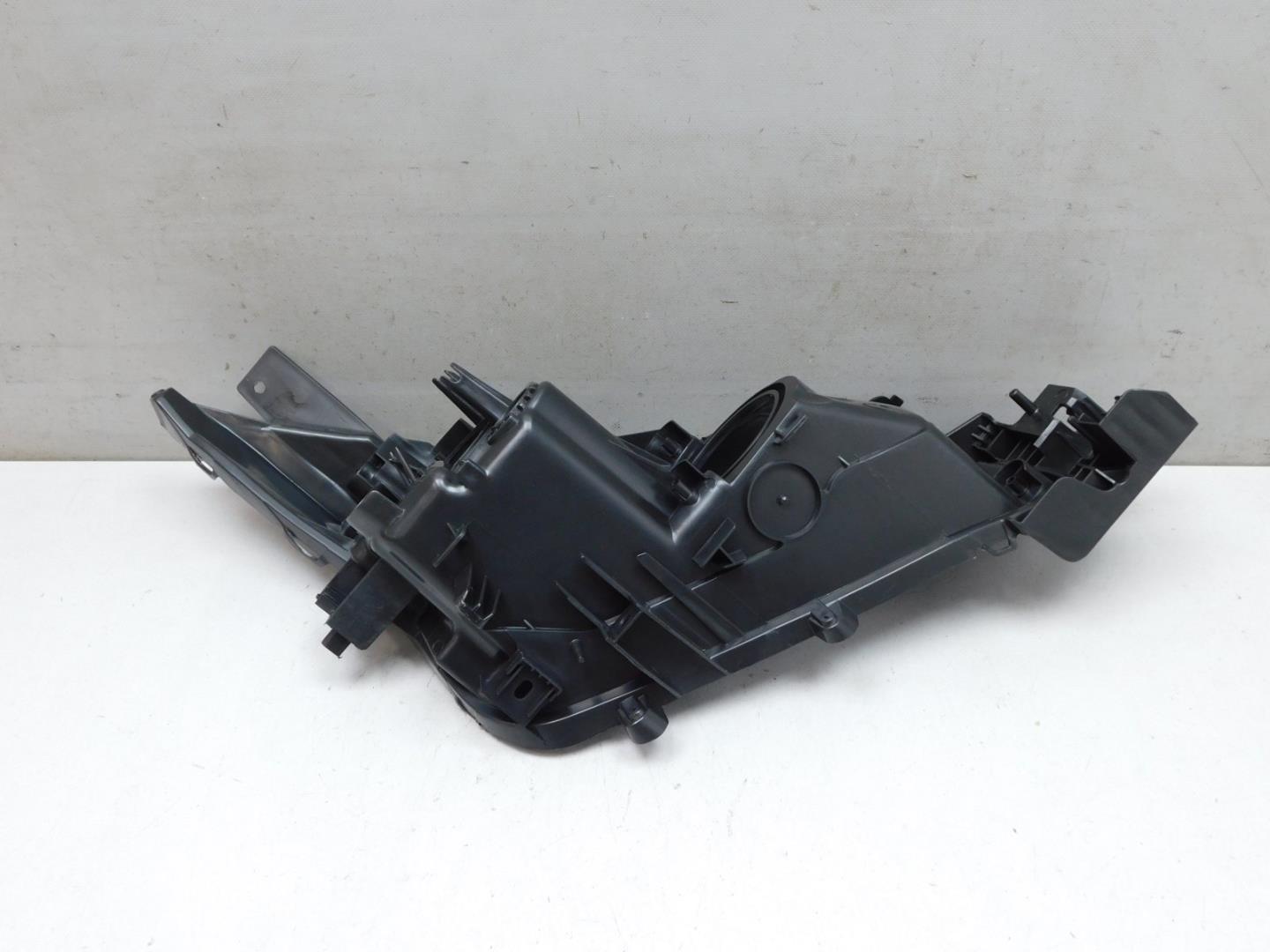 Корпус фары левой