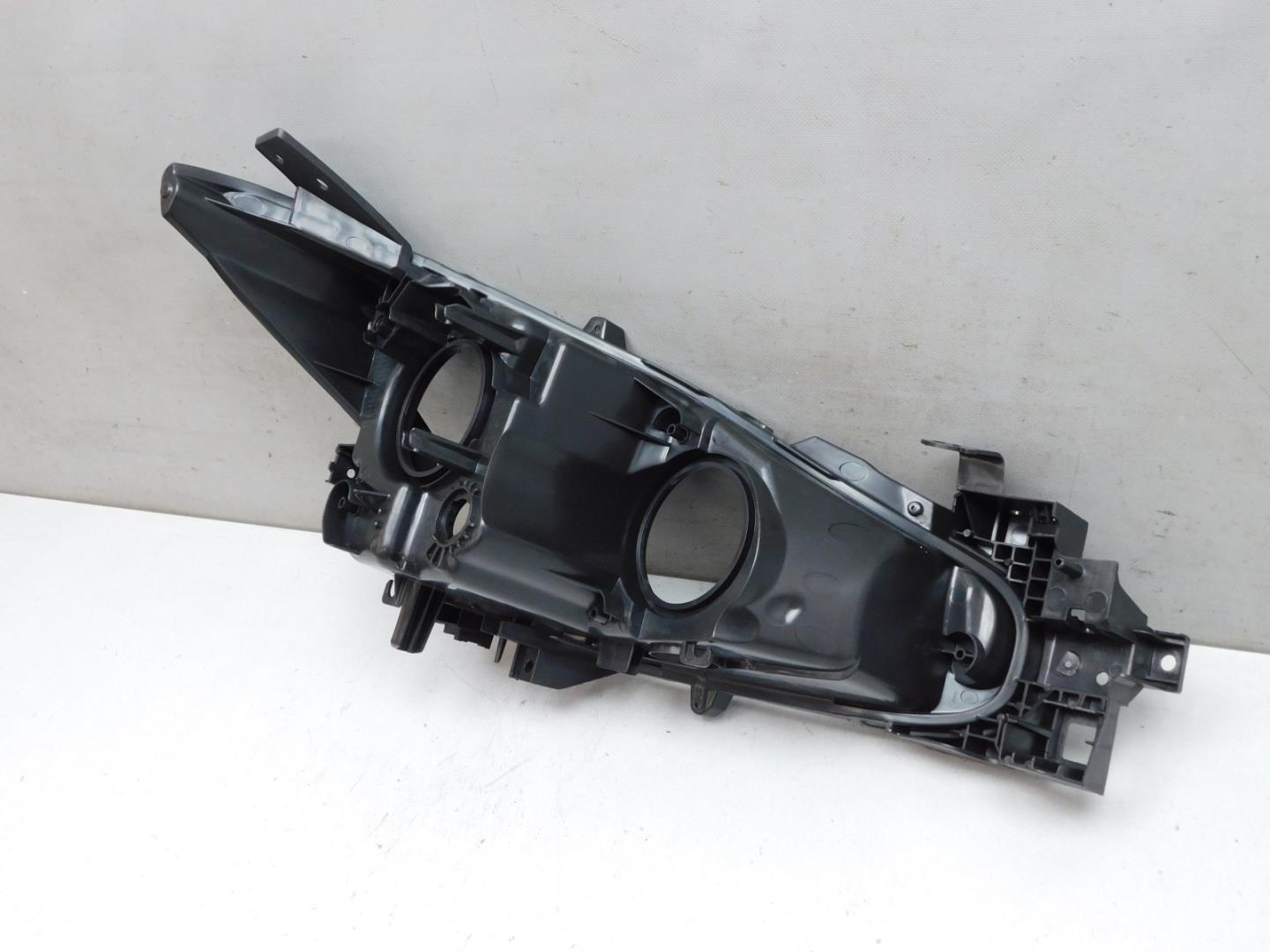 Корпус фары левой