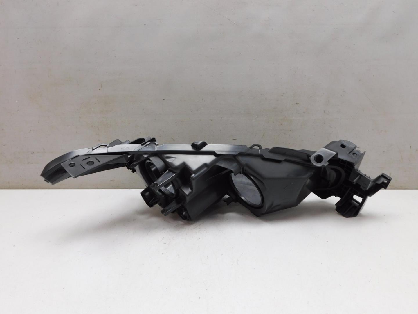 Корпус фары левой