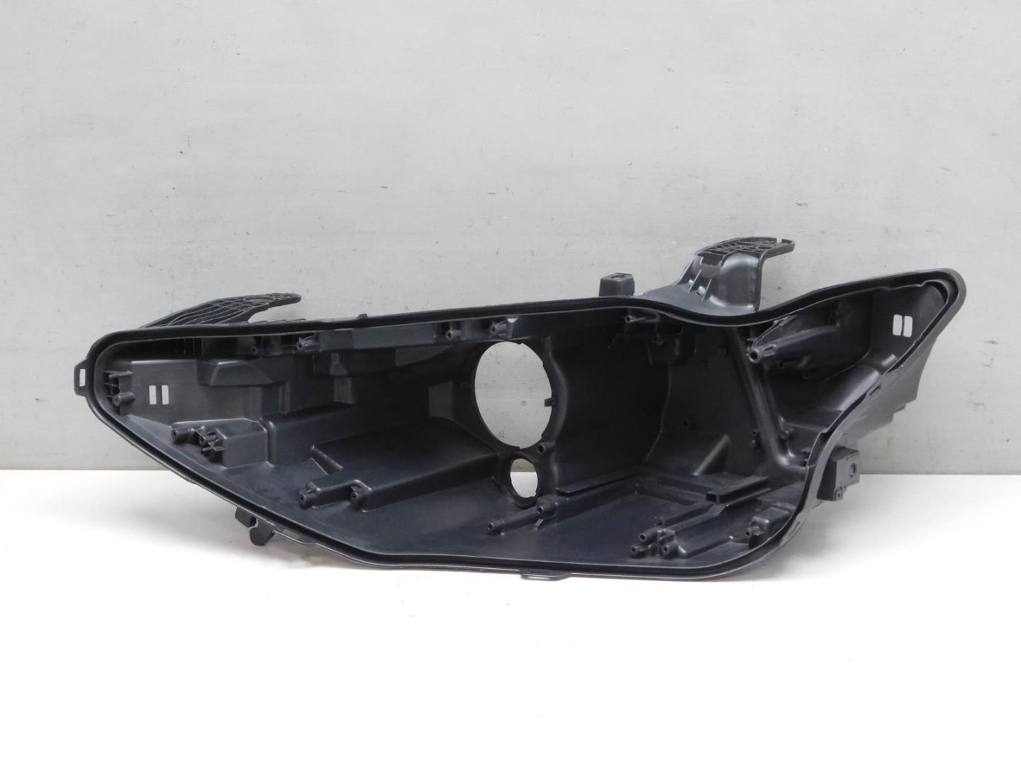 Корпус фары левой