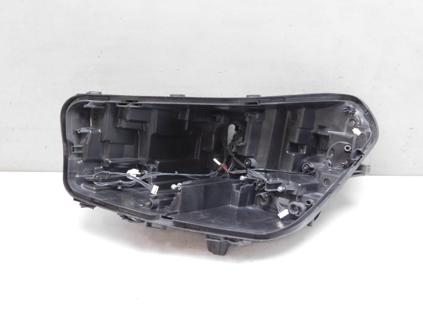 Корпус фары левой