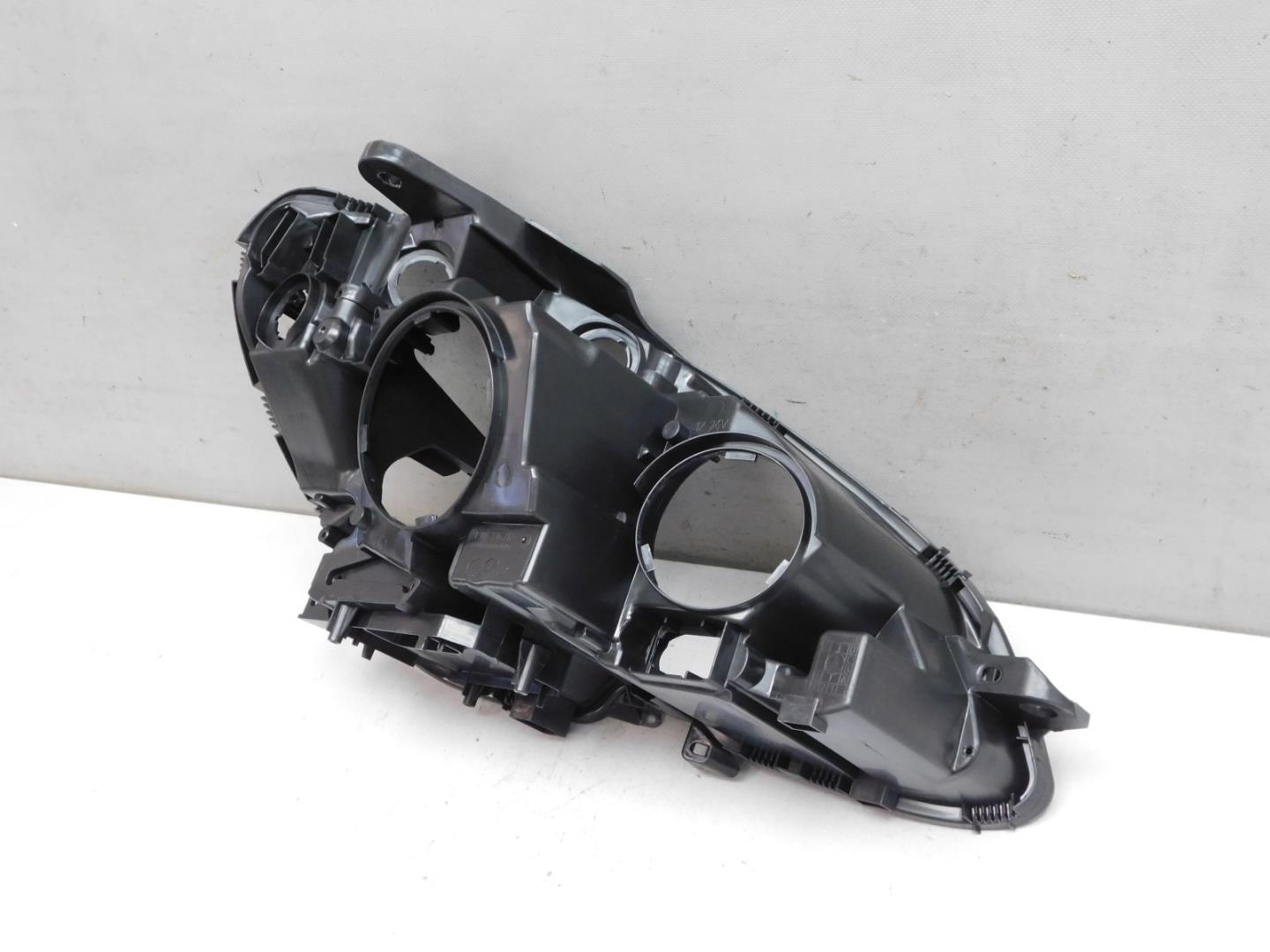 Корпус фары левой