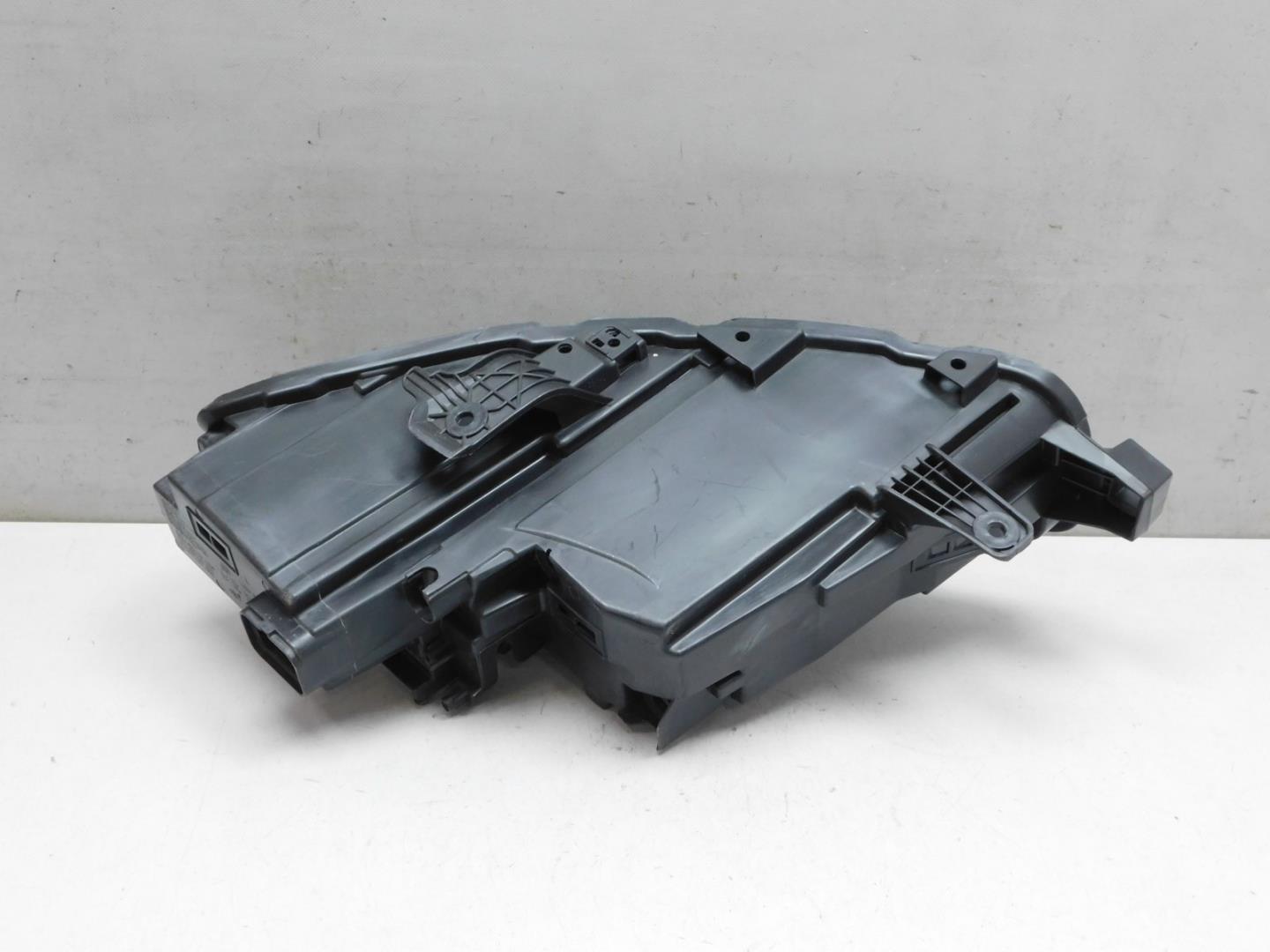 Корпус фары левой