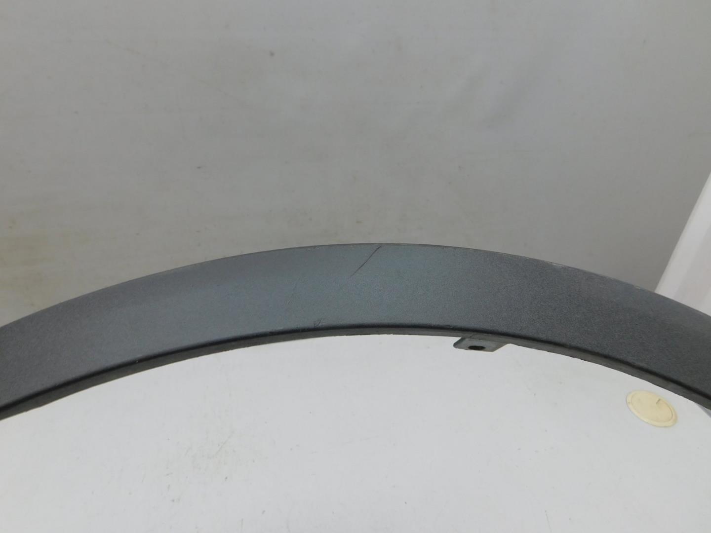 Накладка переднего крыла левого