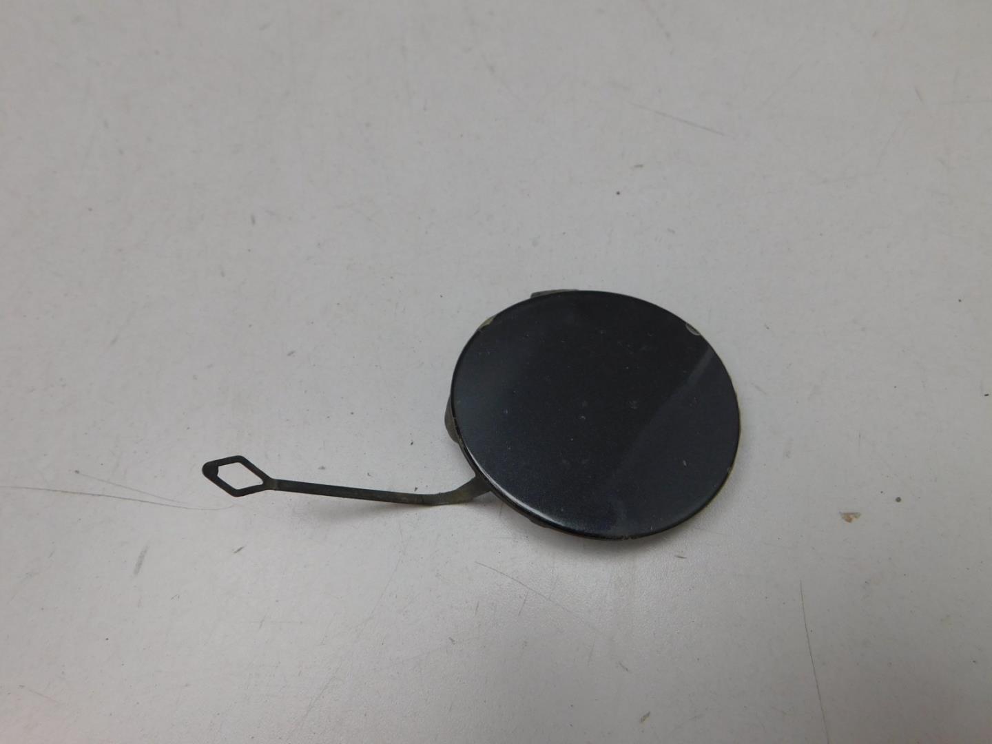 Заглушка буксировочного крюка