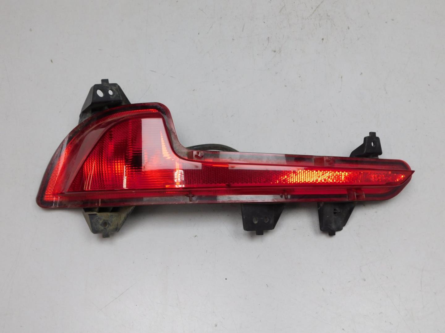 Фонарь задний в бампер левый