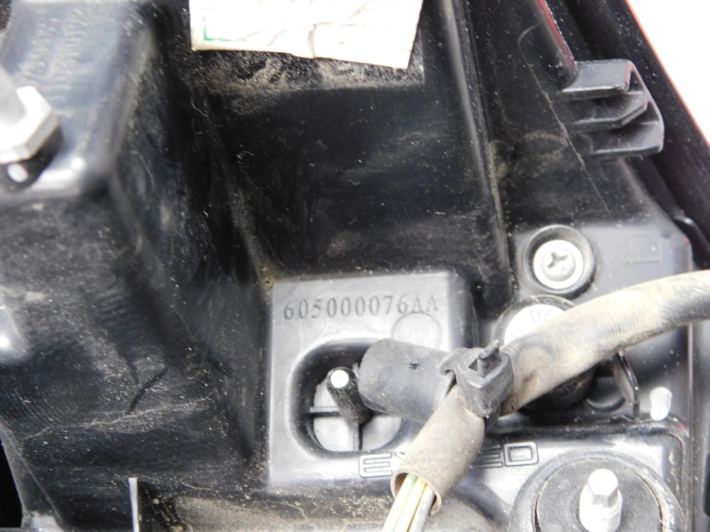 Фонарь задний наружный левый