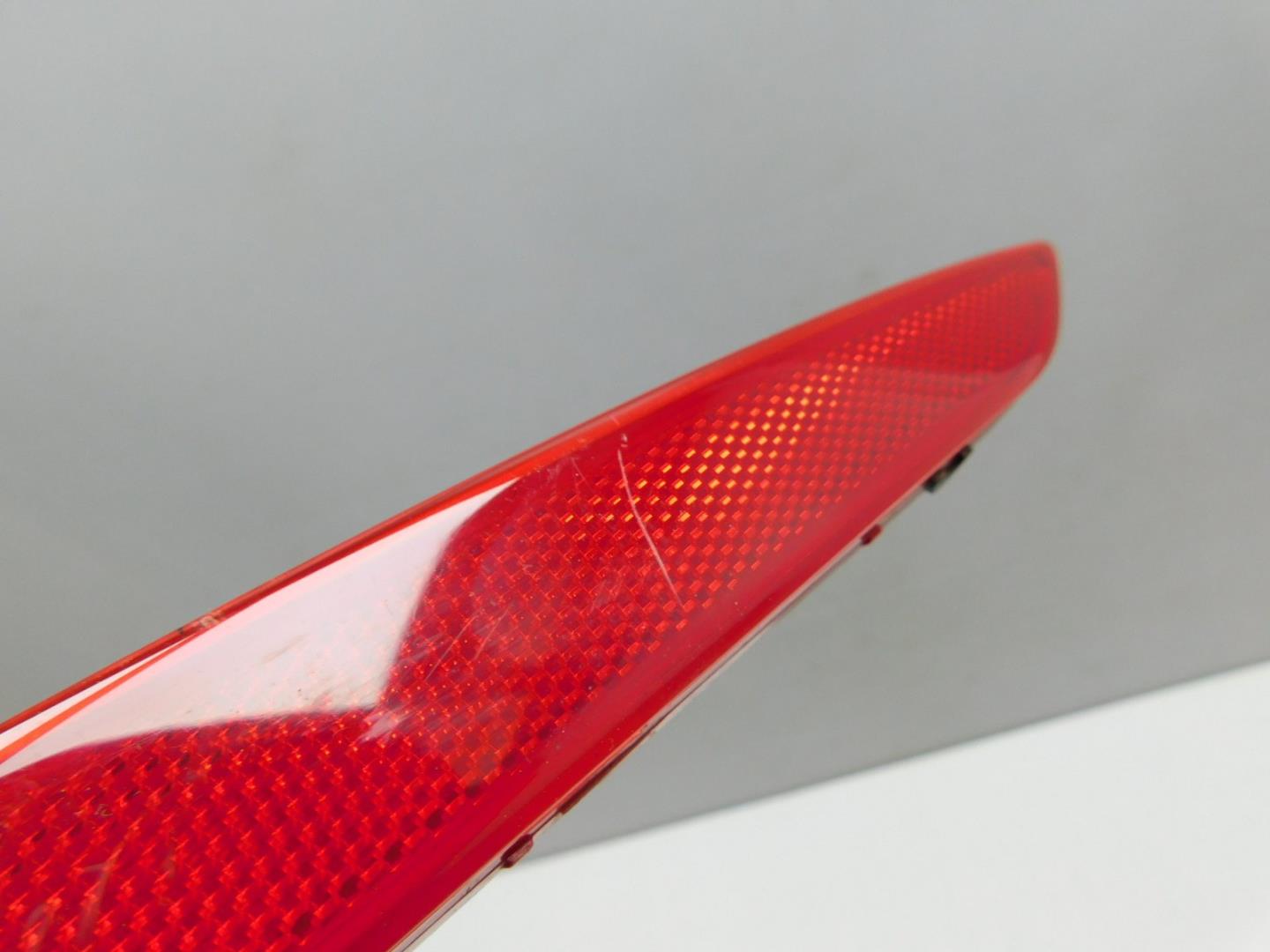 Фонарь задний в бампер левый