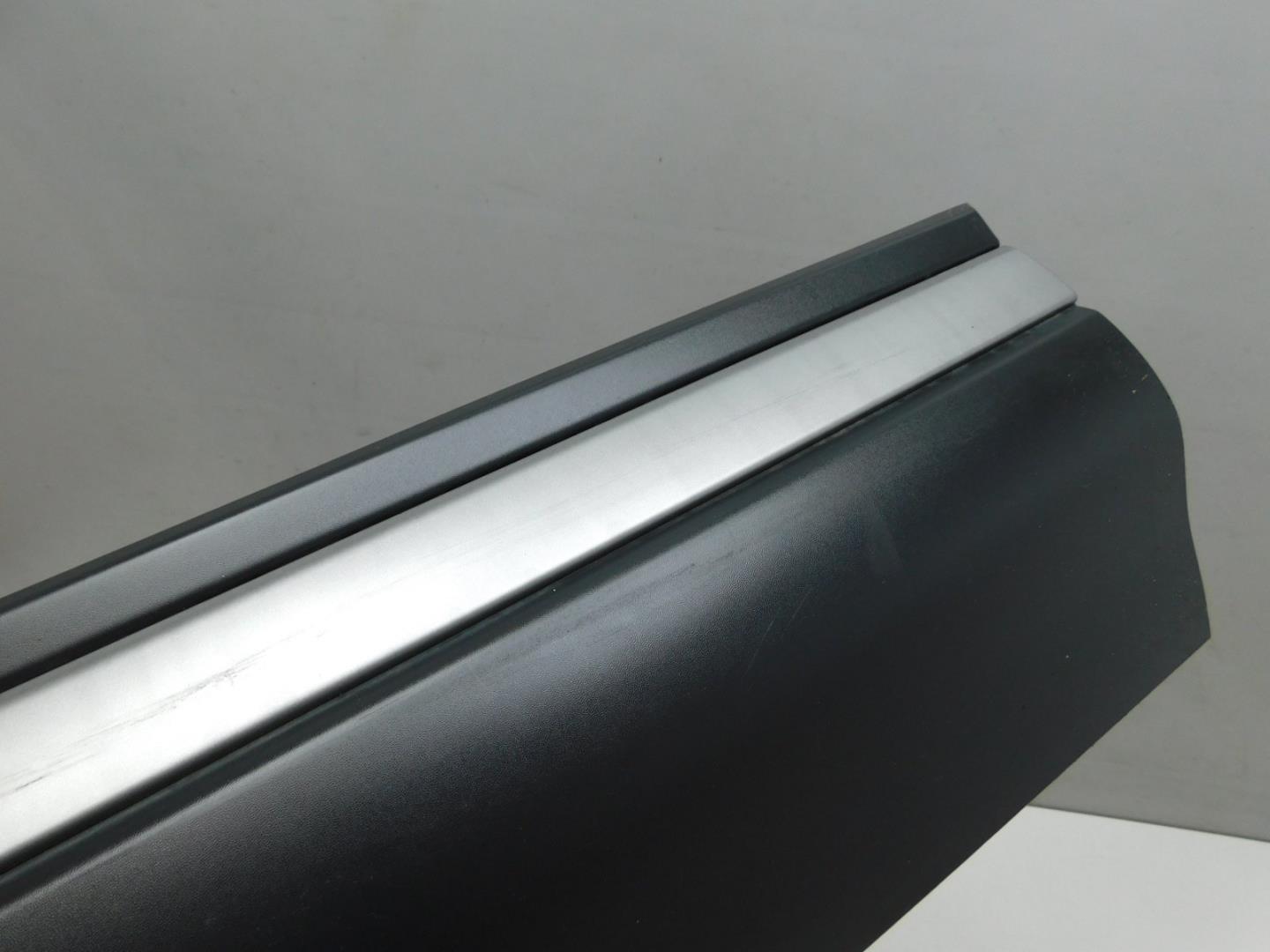 Накладка двери передней левой