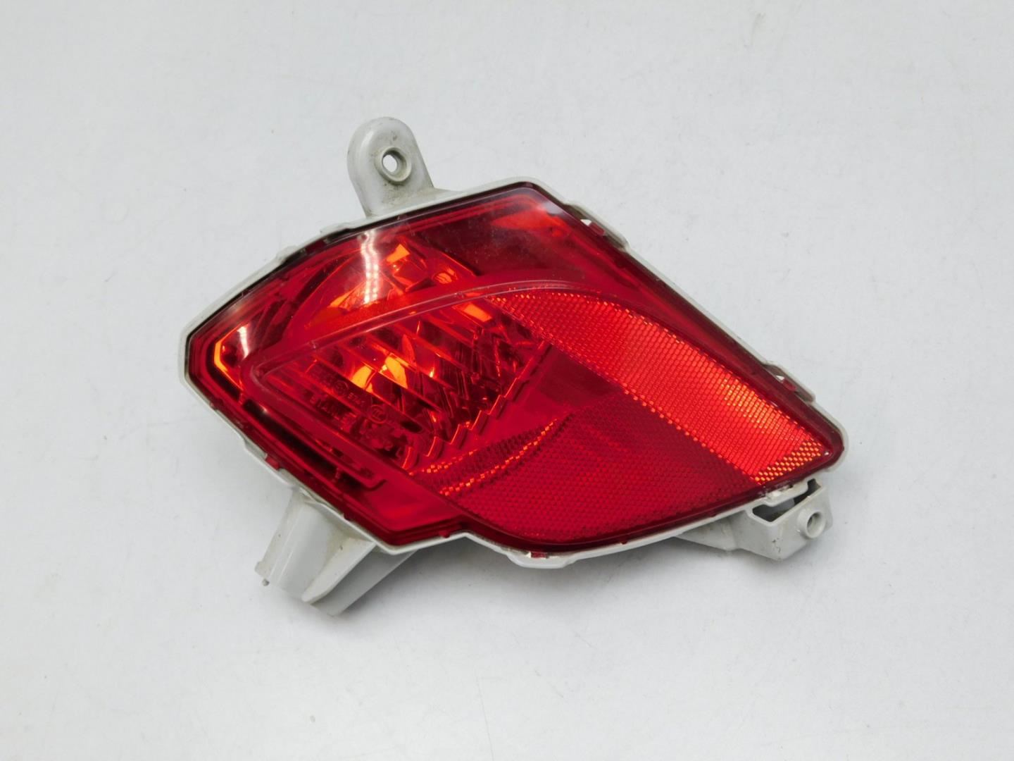 Фонарь задний в бампер левый