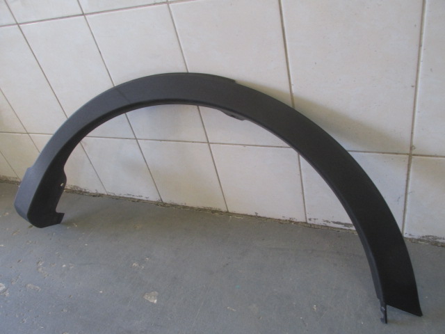 Накладка заднего крыла левого