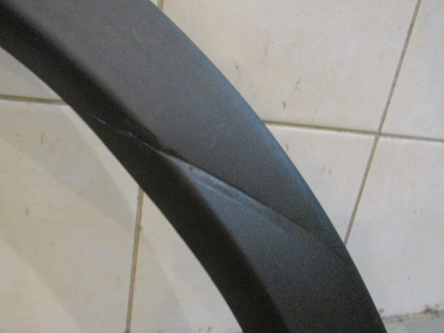 Накладка заднего крыла левого