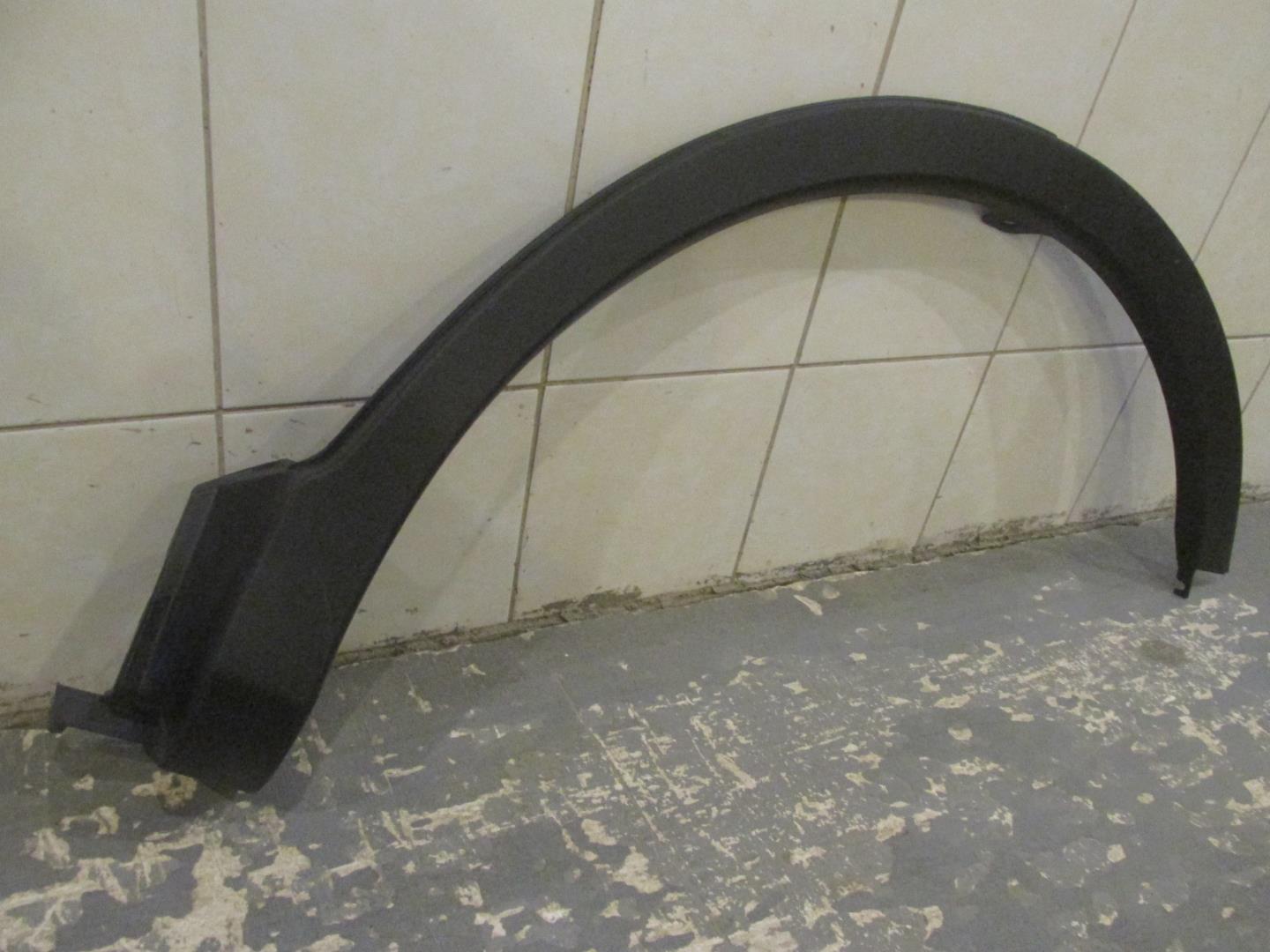 Накладка заднего крыла левого