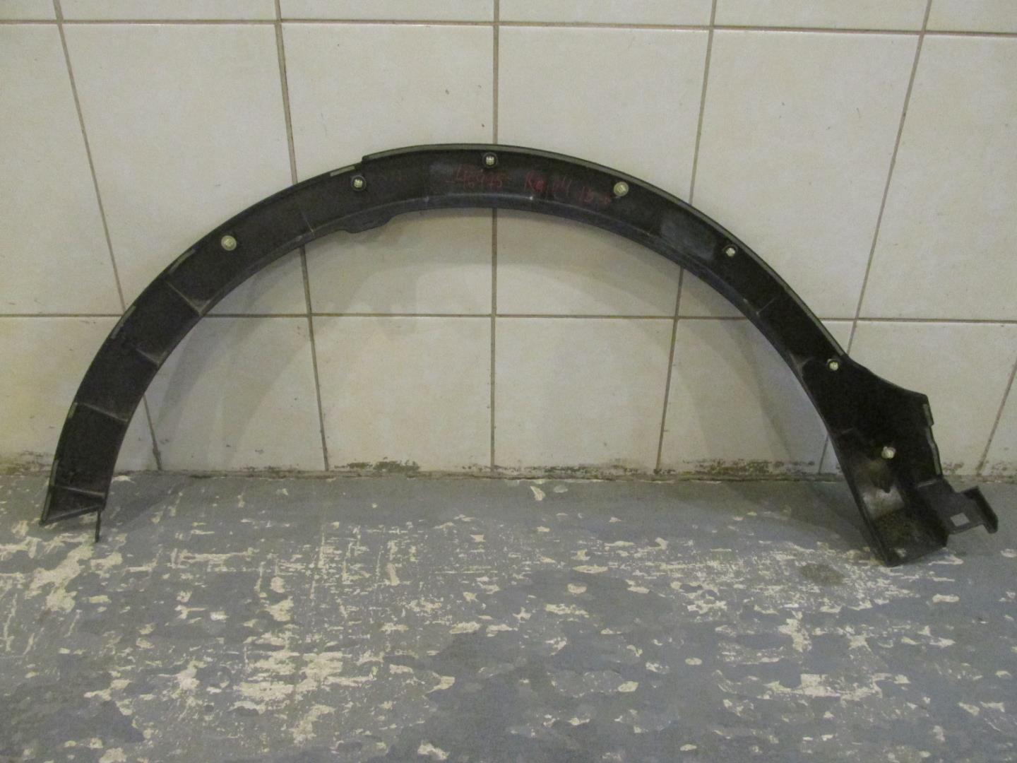 Накладка заднего крыла левого