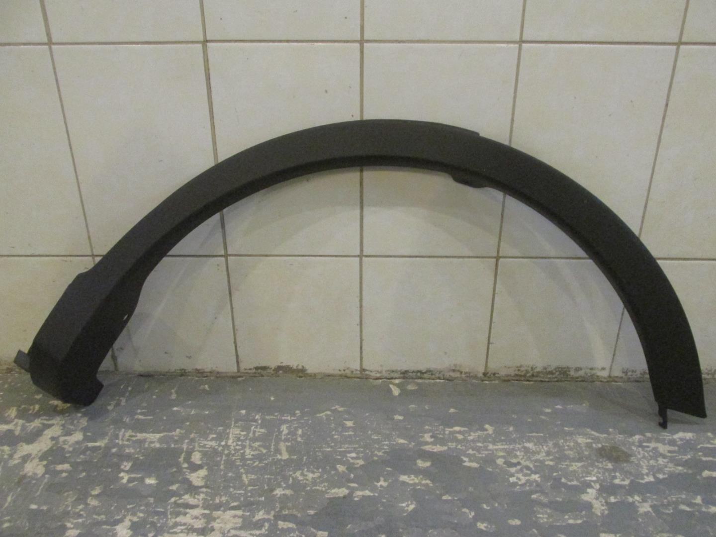 Накладка заднего крыла левого