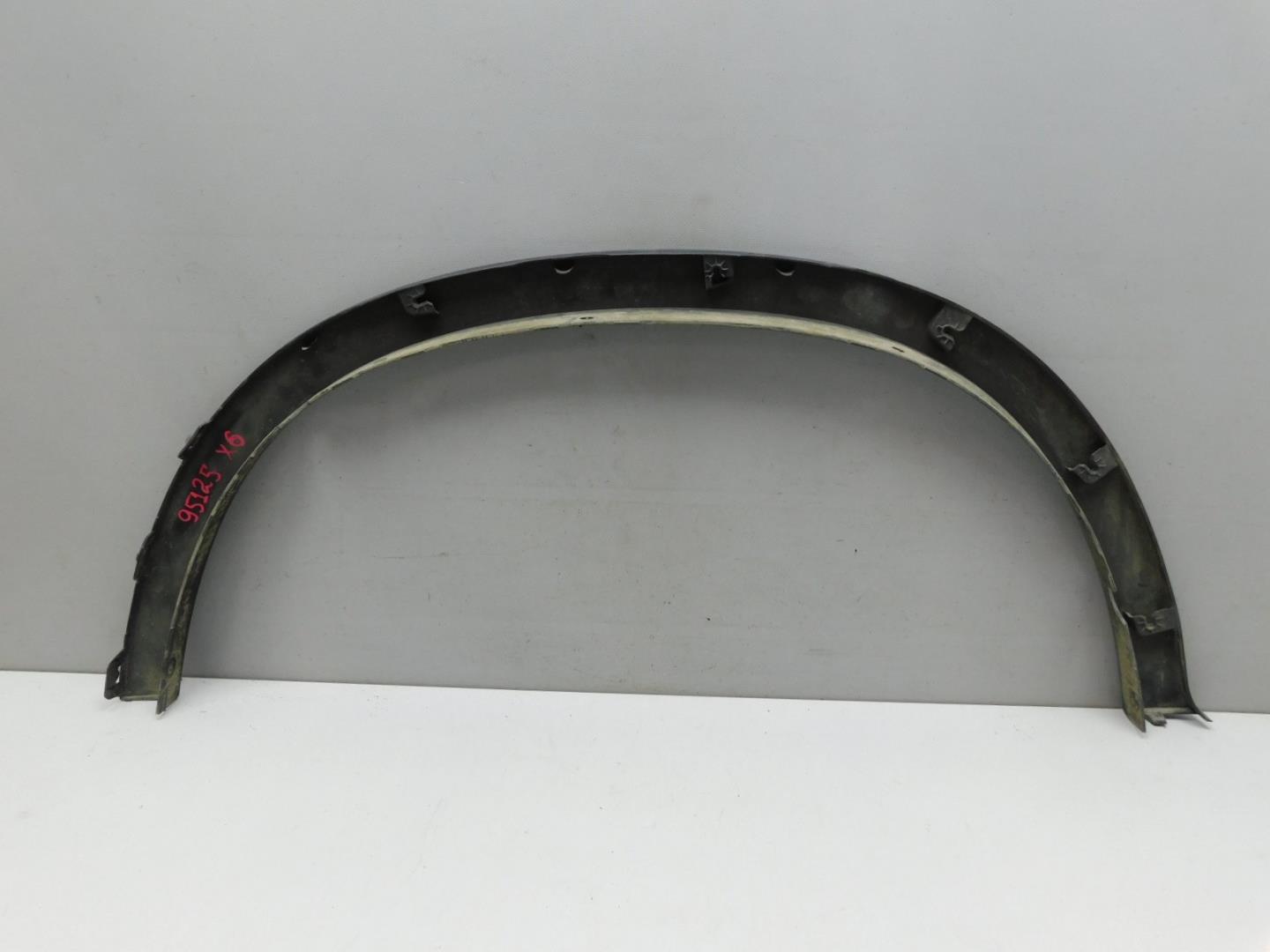 Накладка заднего крыла левого