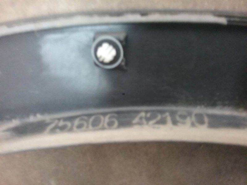 Накладка заднего крыла левого