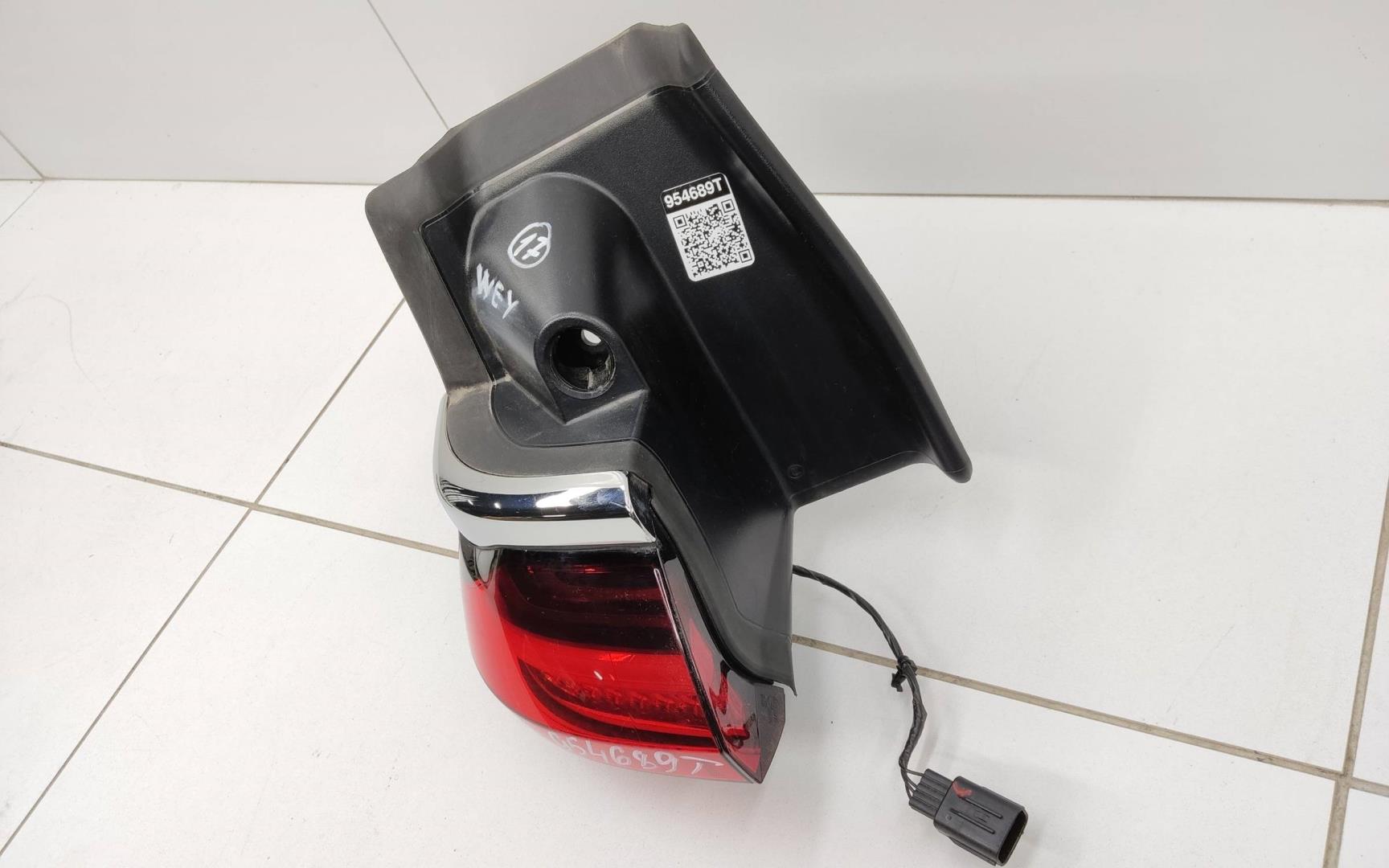 Фонарь задний наружный левый