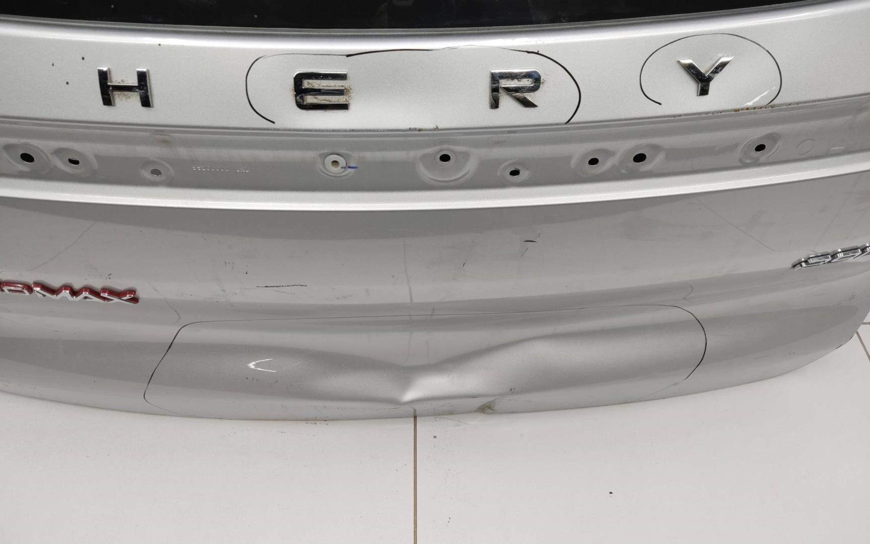 Стекло двери багажника