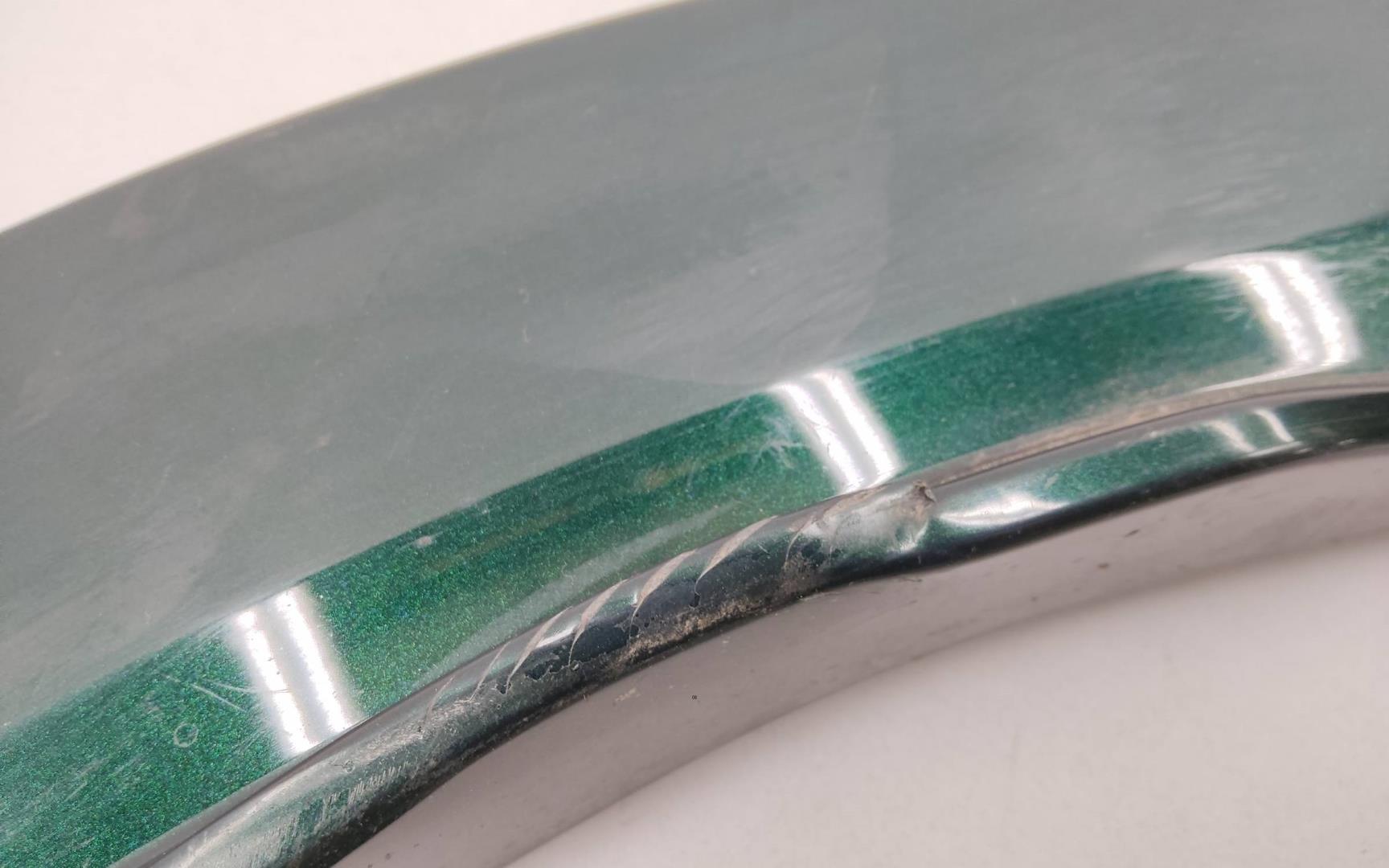 Накладка заднего крыла левого