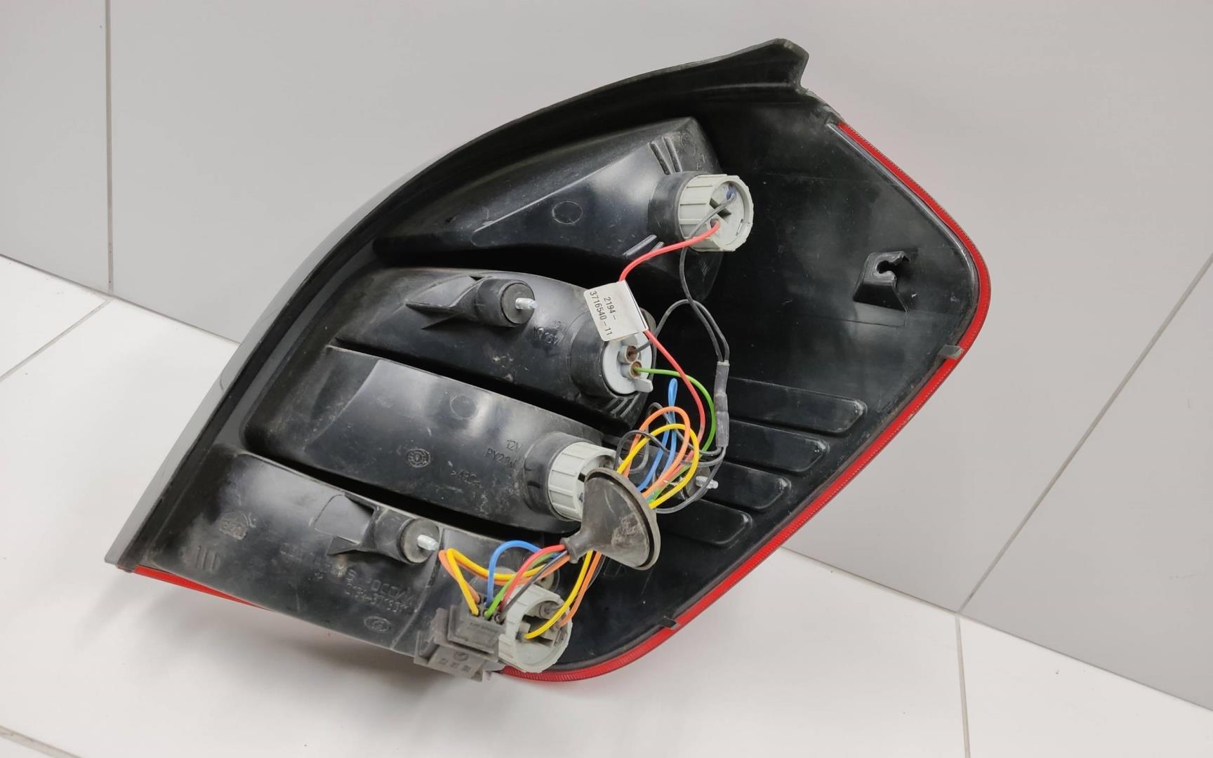 Фонарь задний левый