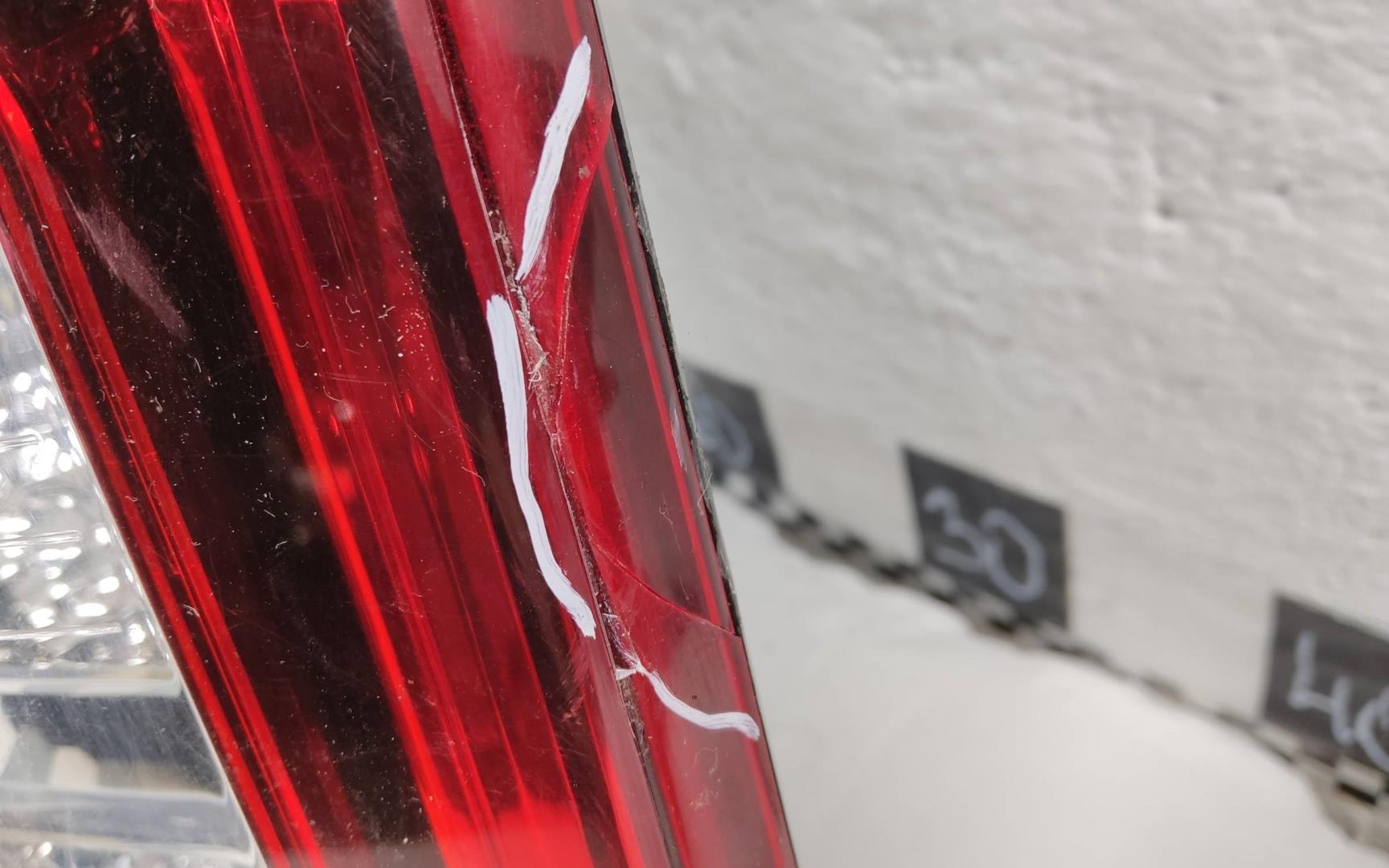 Фонарь задний левый