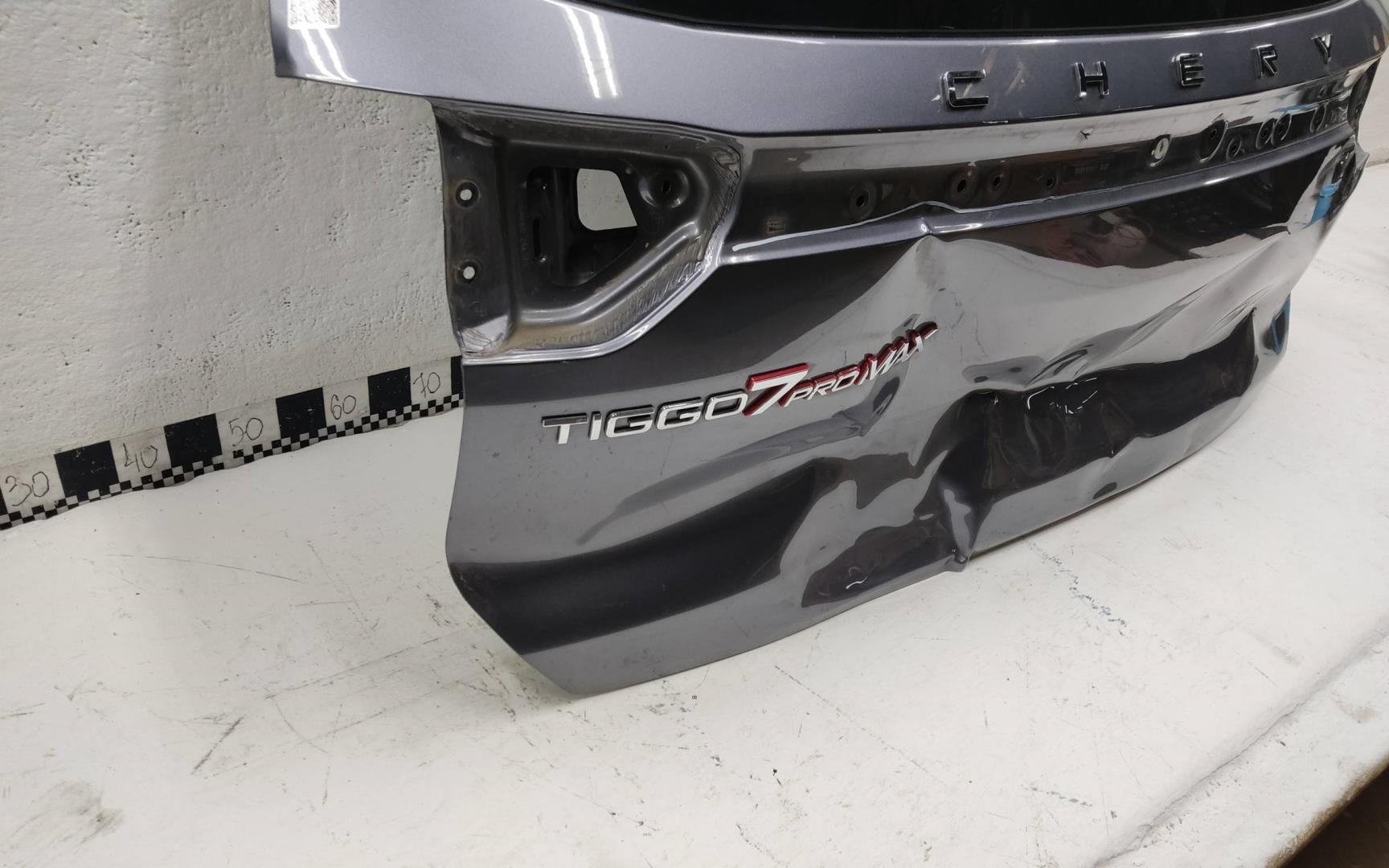 Стекло двери багажника