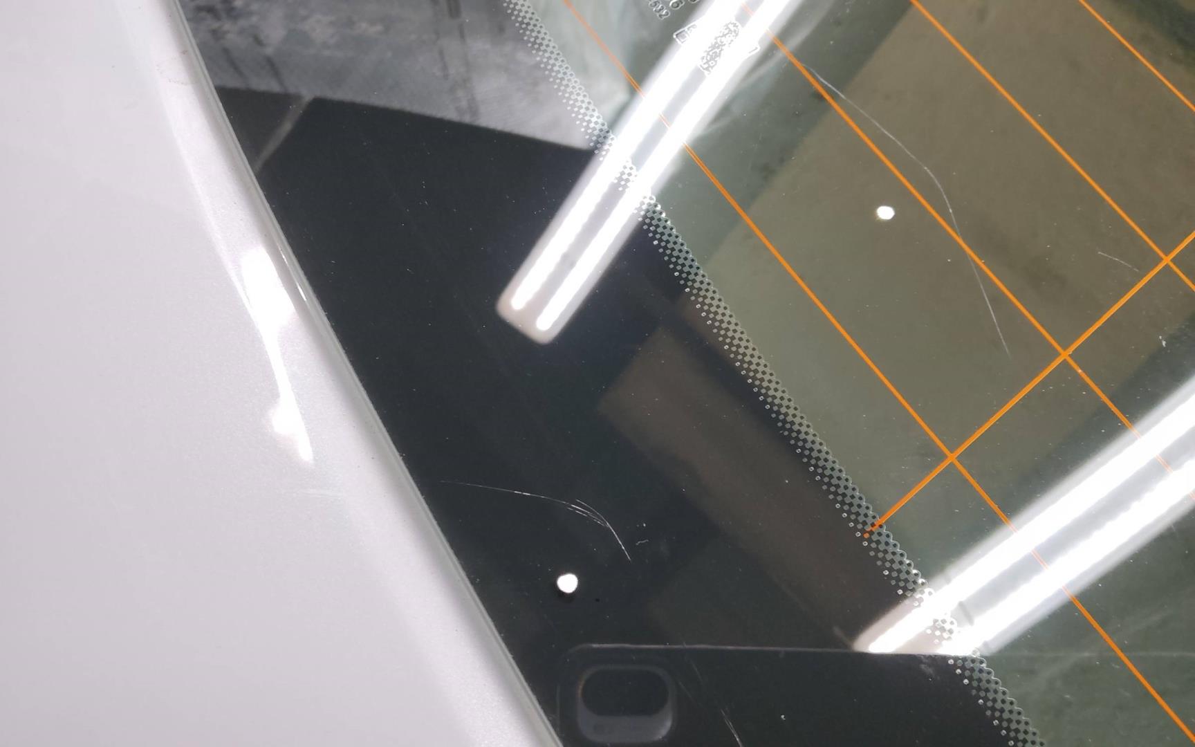 Стекло двери багажника