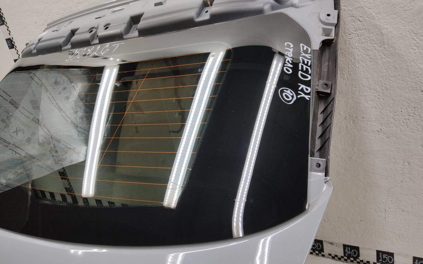 Стекло двери багажника