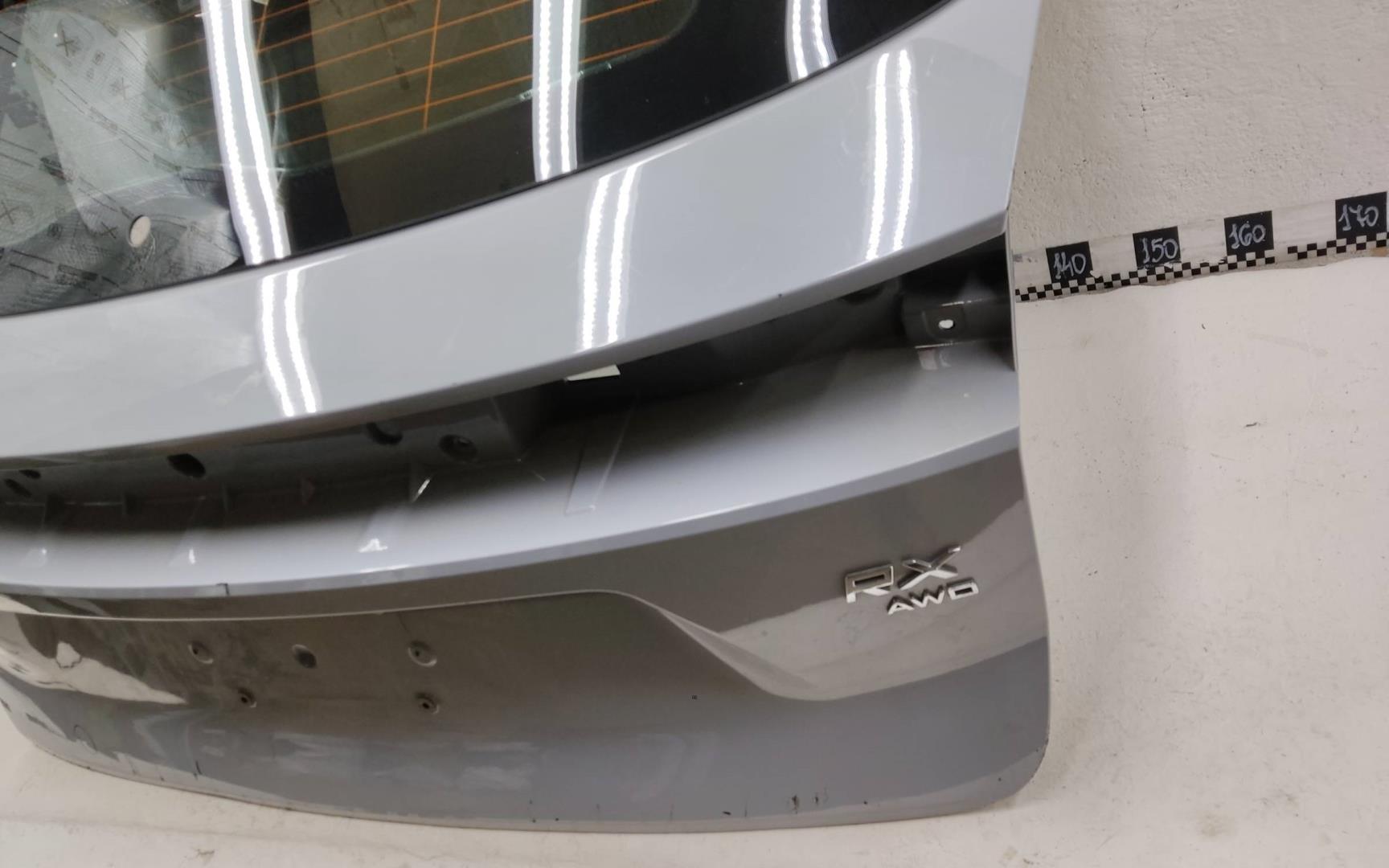 Стекло двери багажника