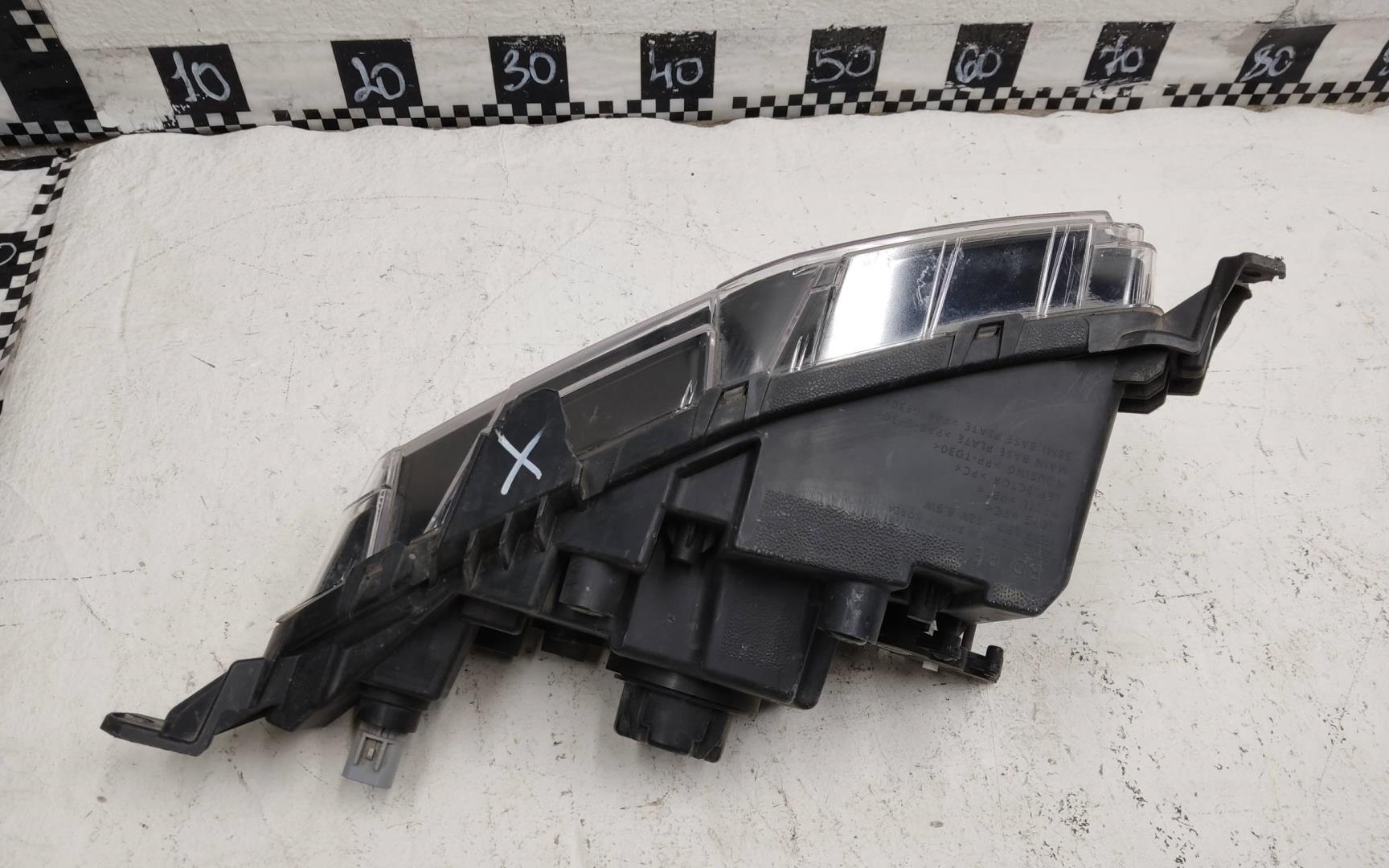 Фара противотуманная левая