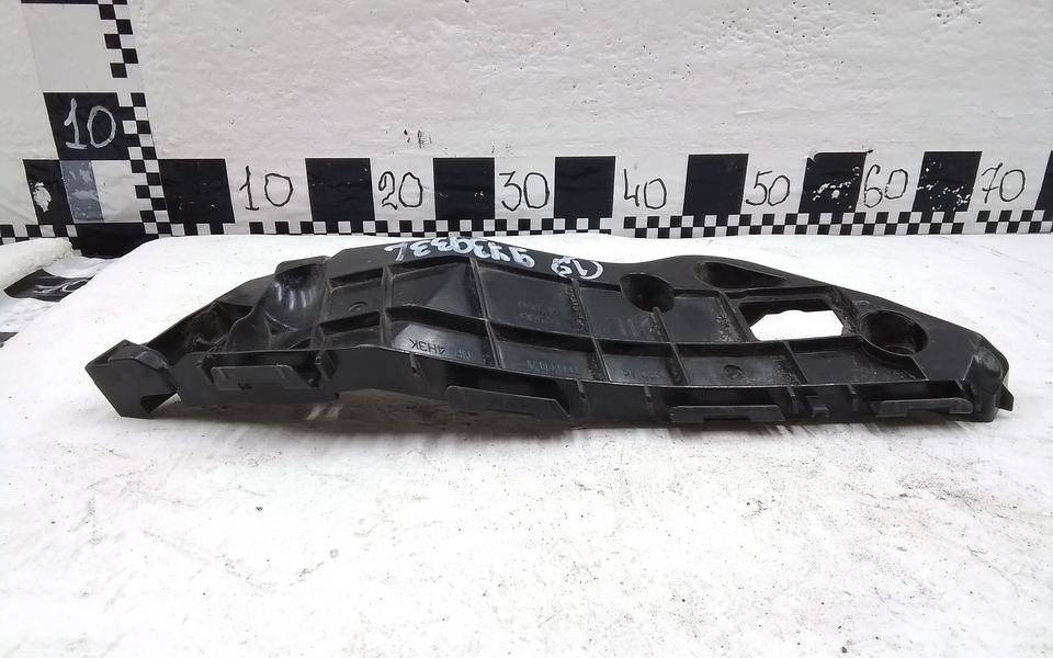 Кронштейн переднего бампера левый