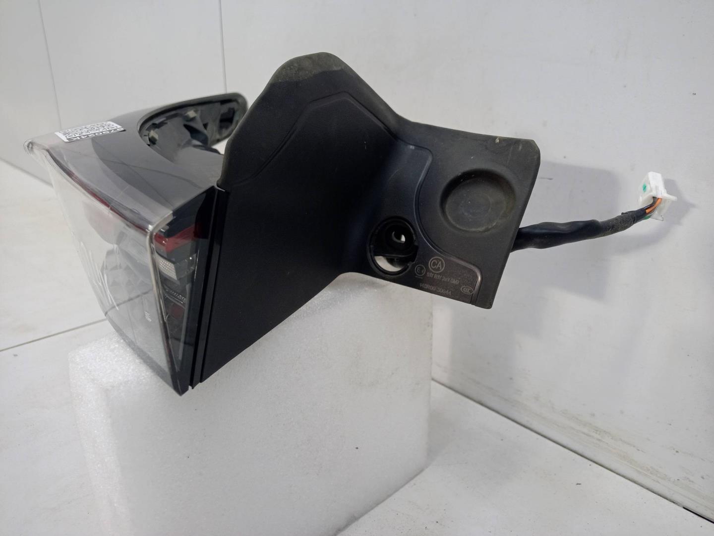 Фонарь задний наружный левый