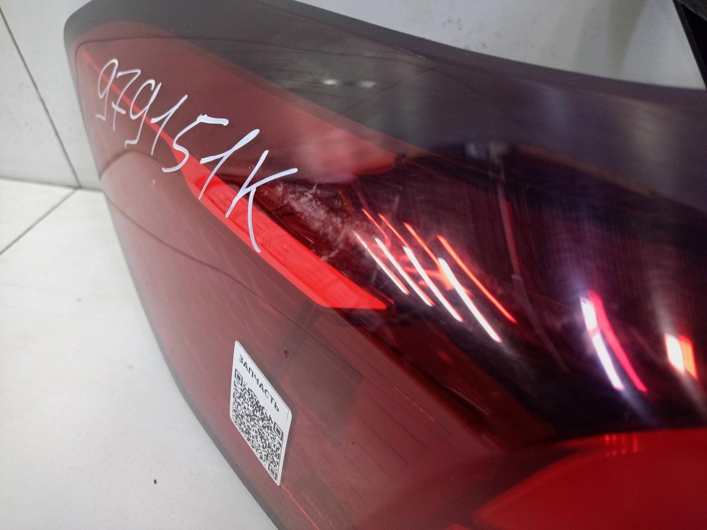 Фонарь задний наружный левый