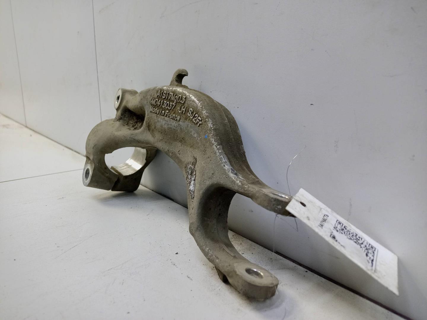 Кронштейн амортизатора левый