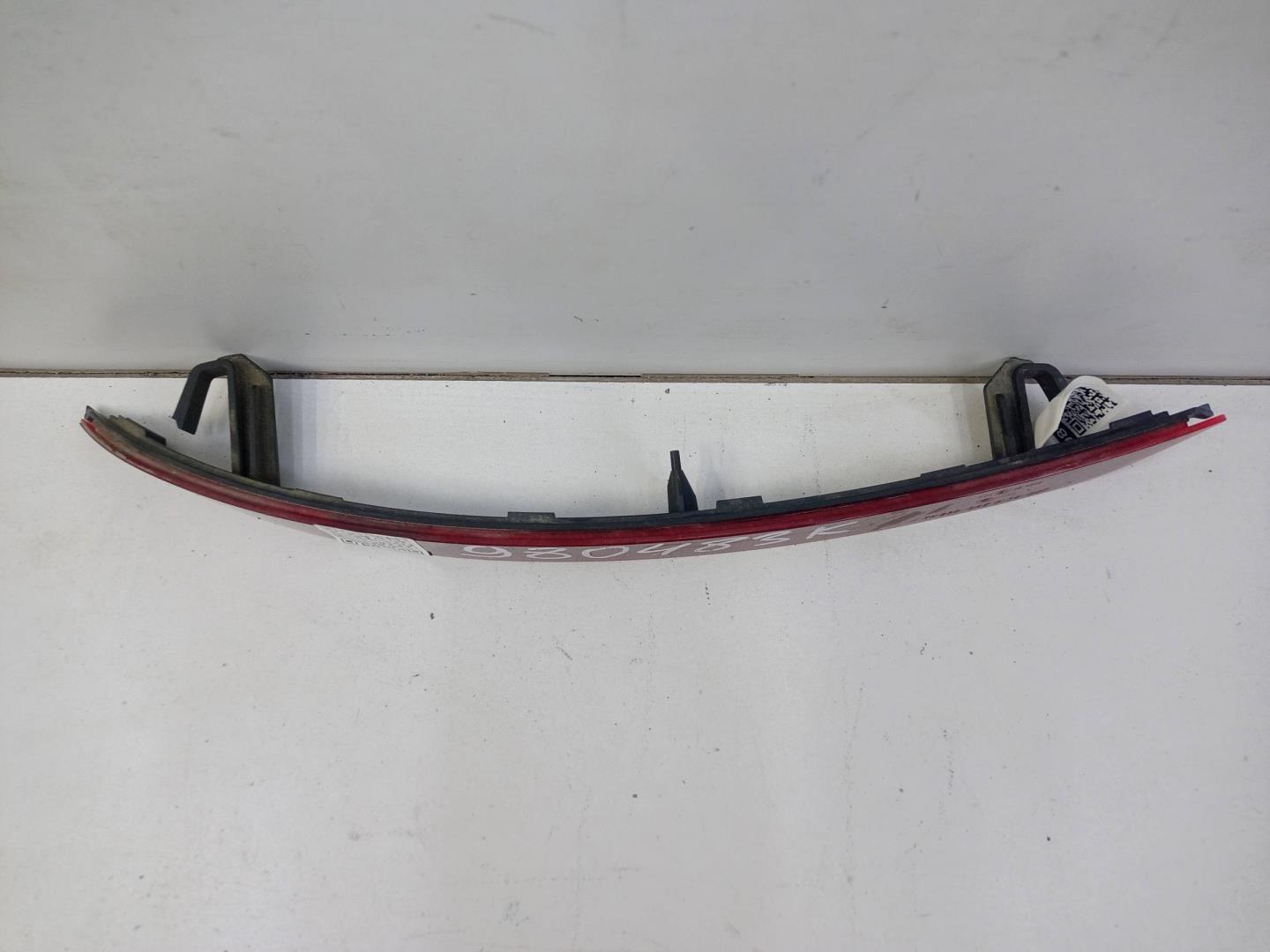 Отражатель в бампер задний левый